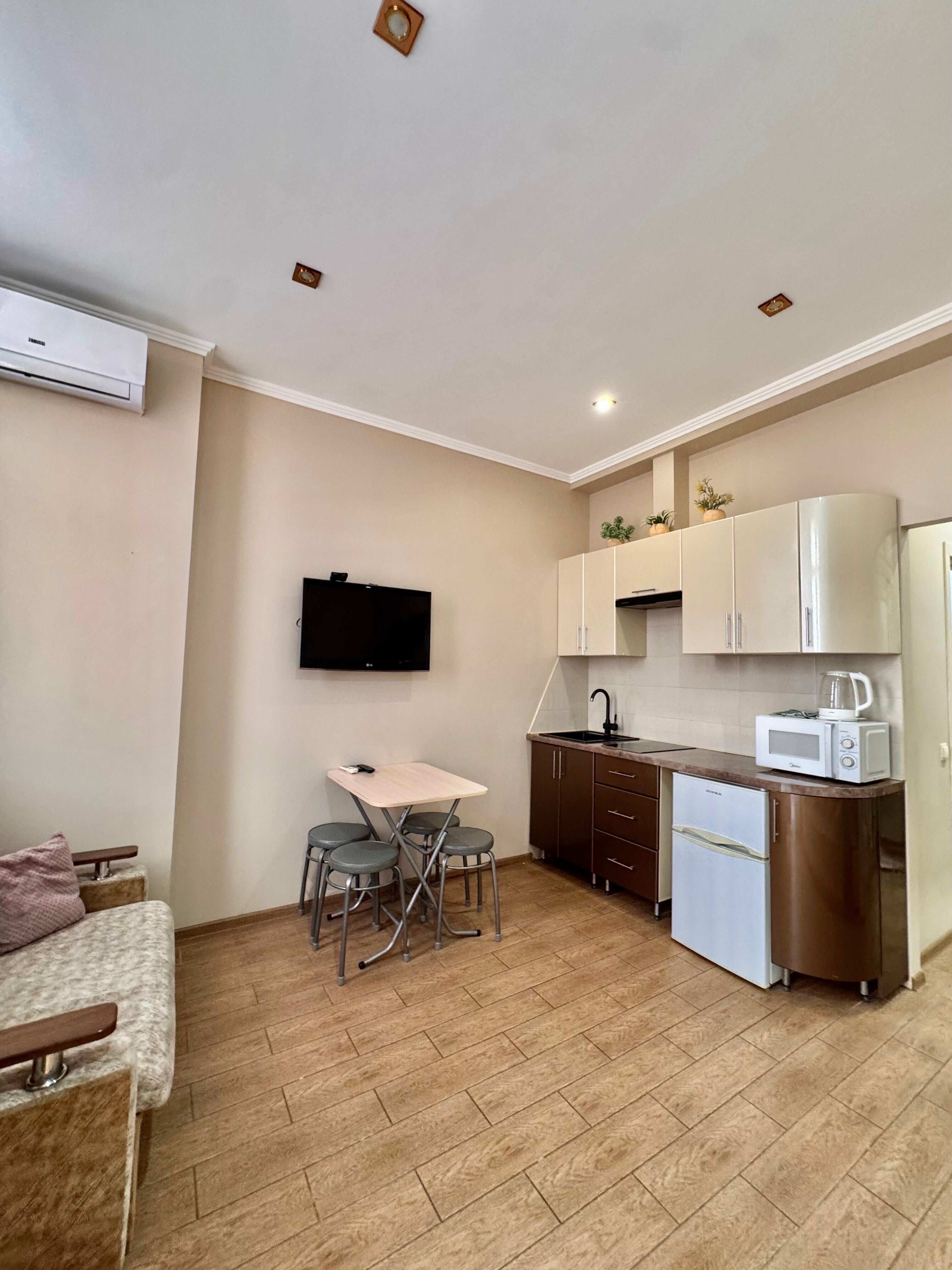 Трехместный номер с балконом