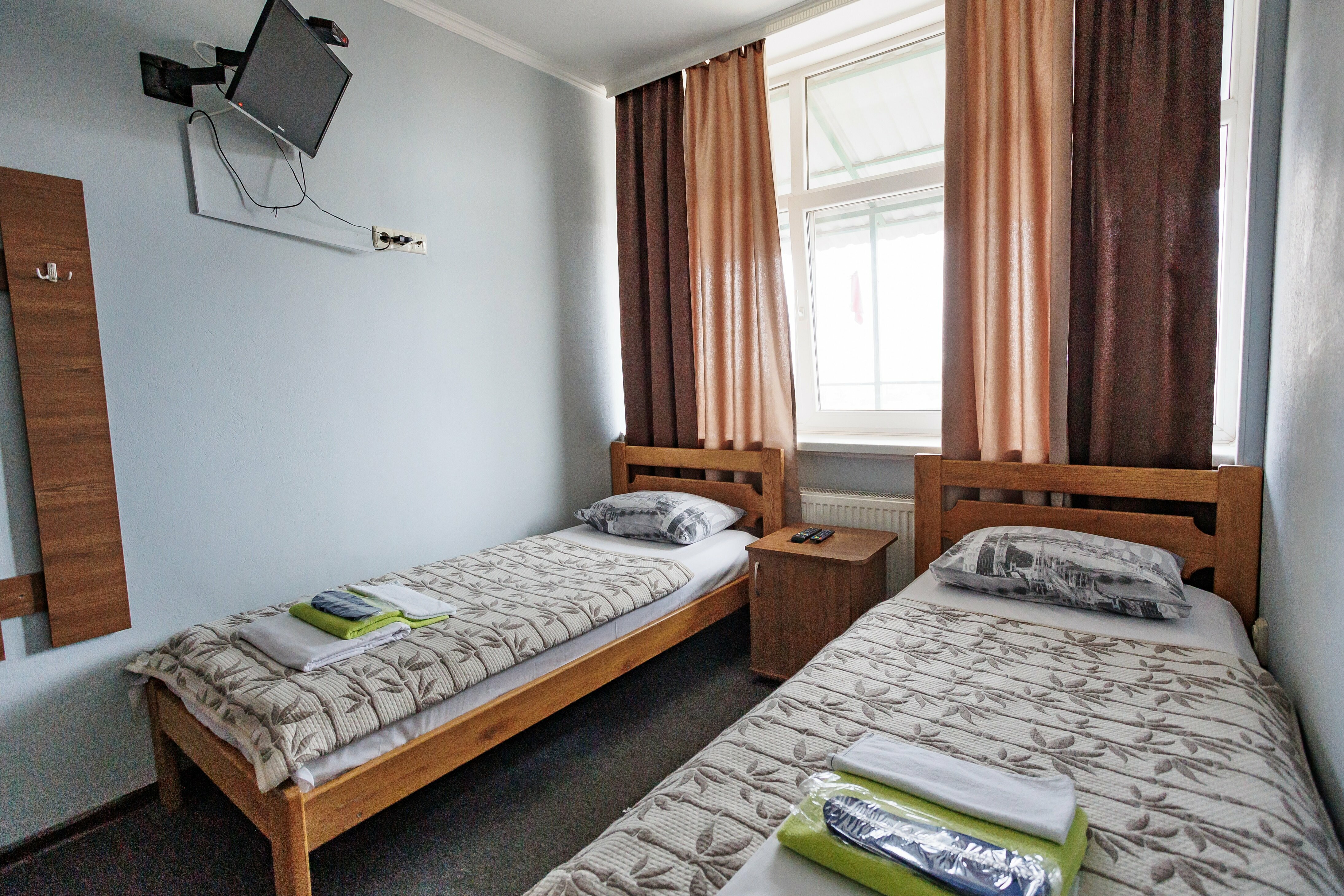 Двухместный номер с 2 отдельными кроватями и душем