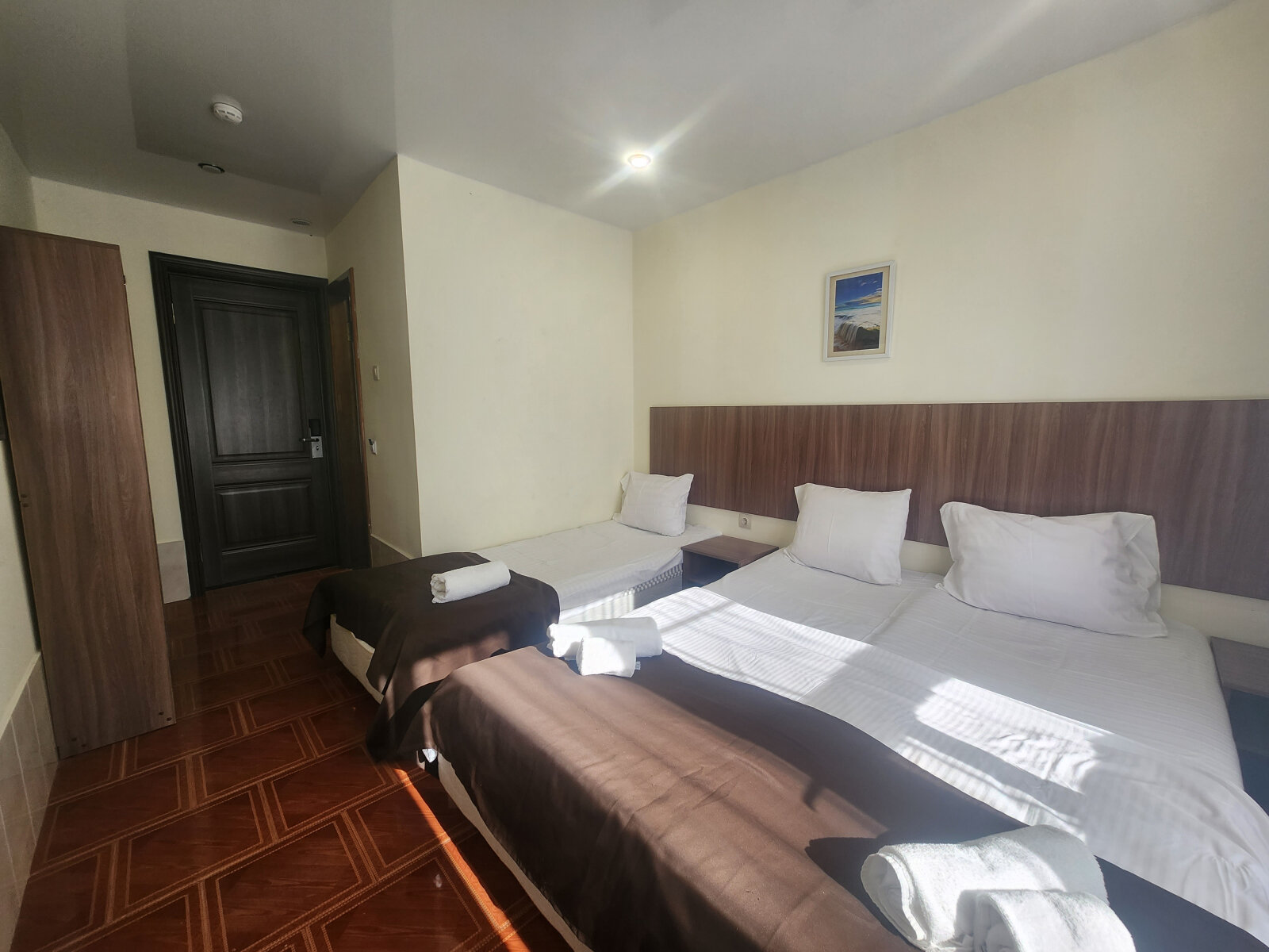 Трехместный номер с балконом