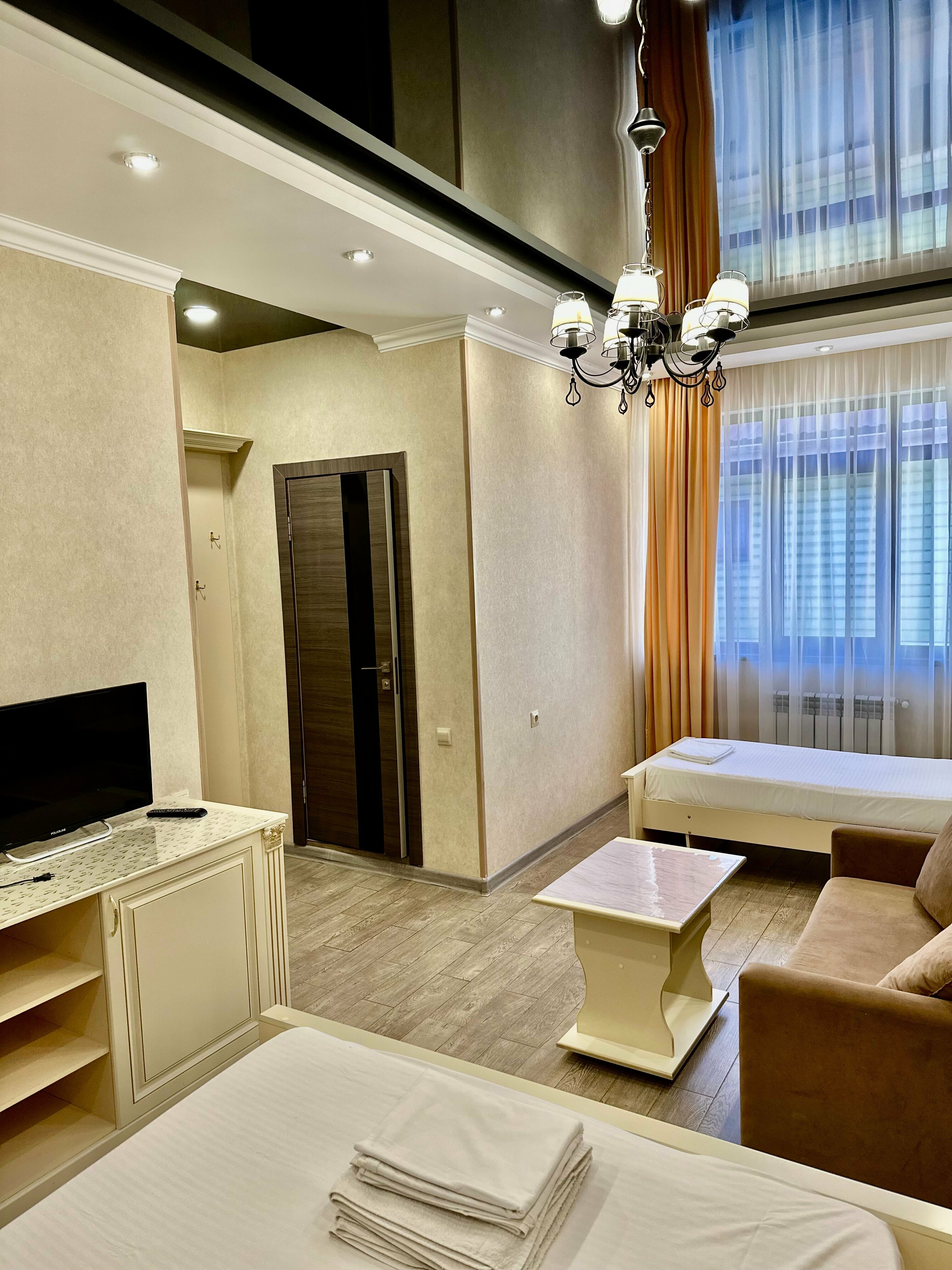 Улучшенный четырехместный номер