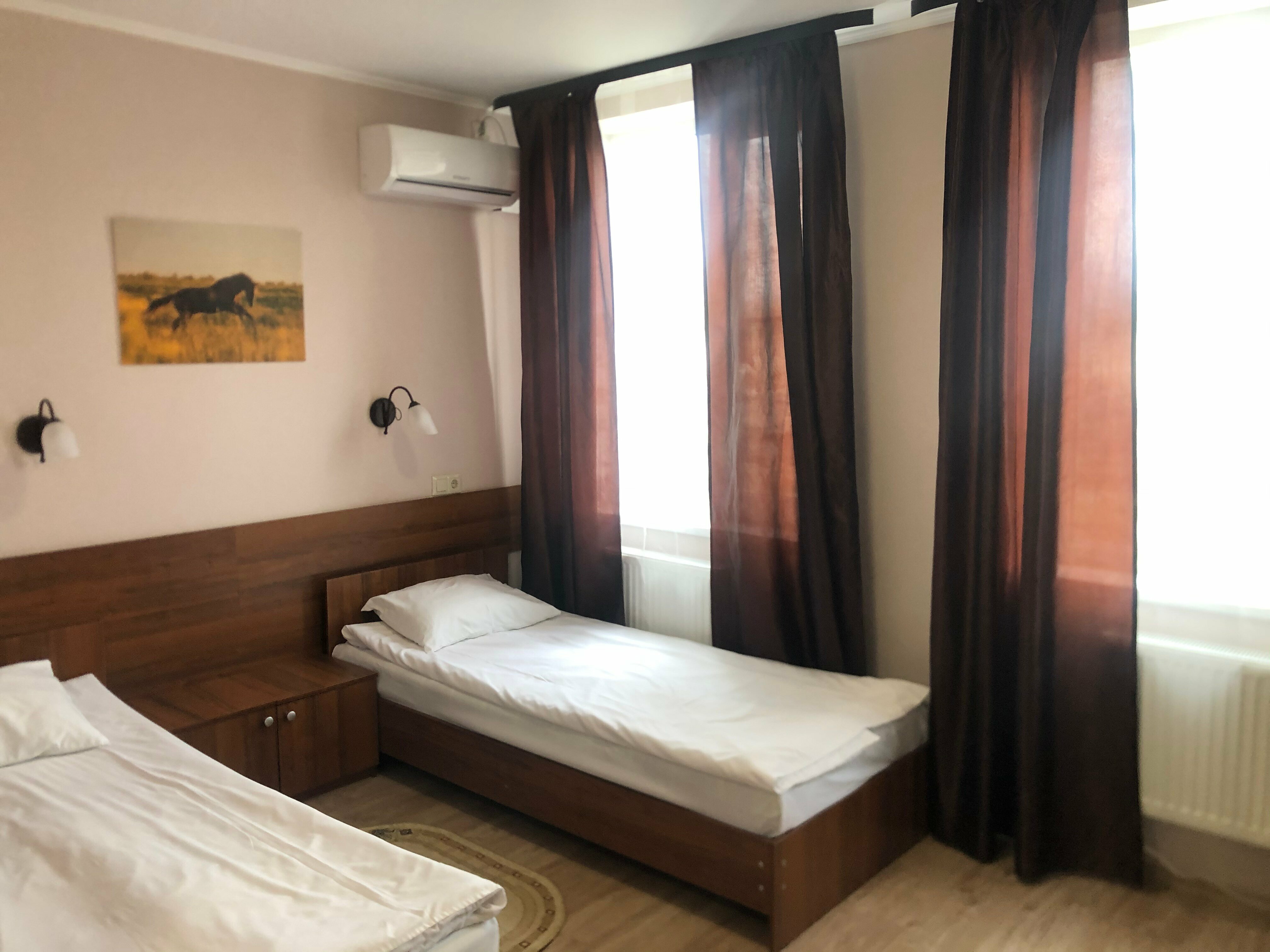 Двухместный номер с 2 отдельными кроватями и душем