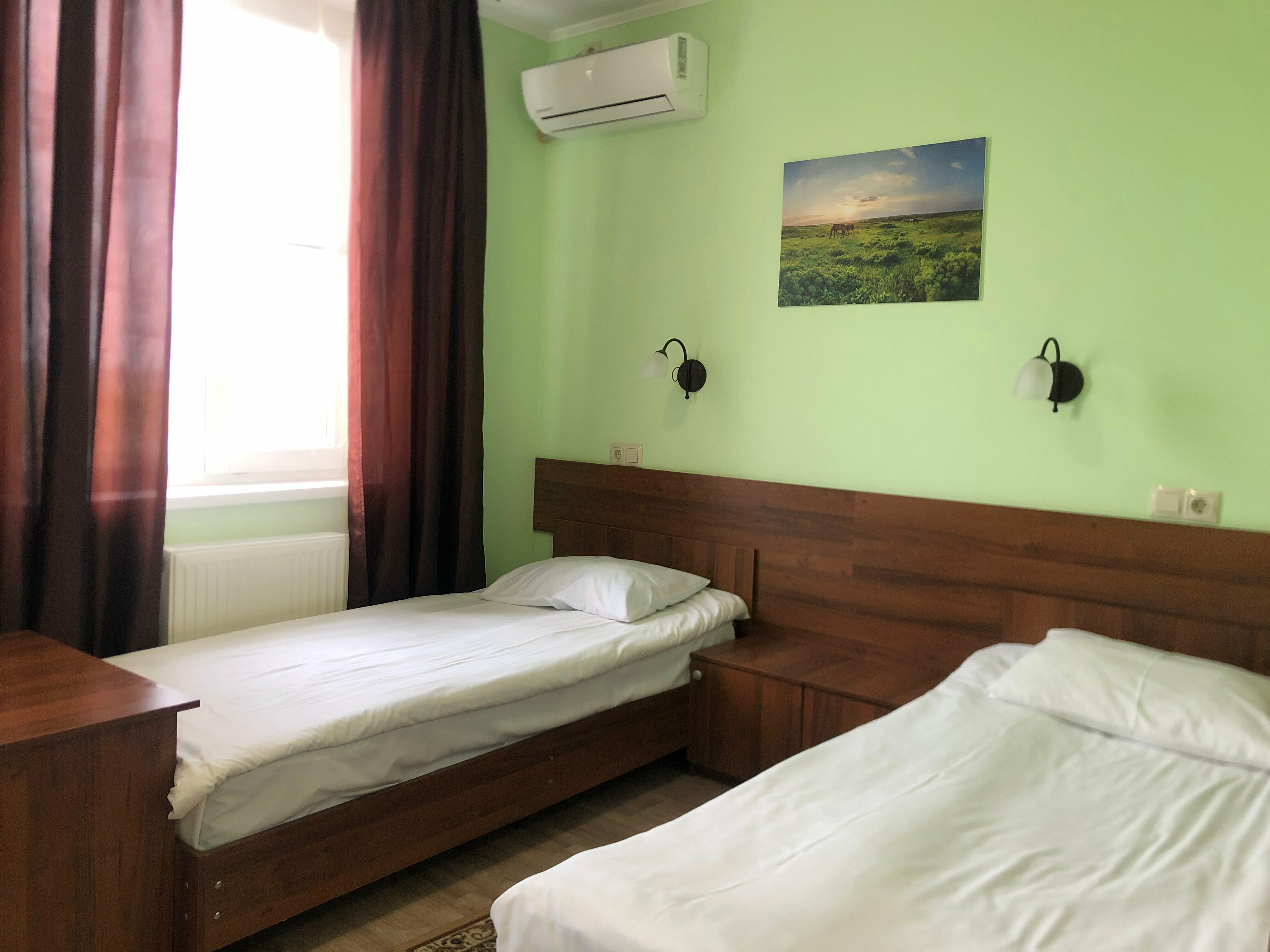 Двухместный номер с 2 отдельными кроватями и душем