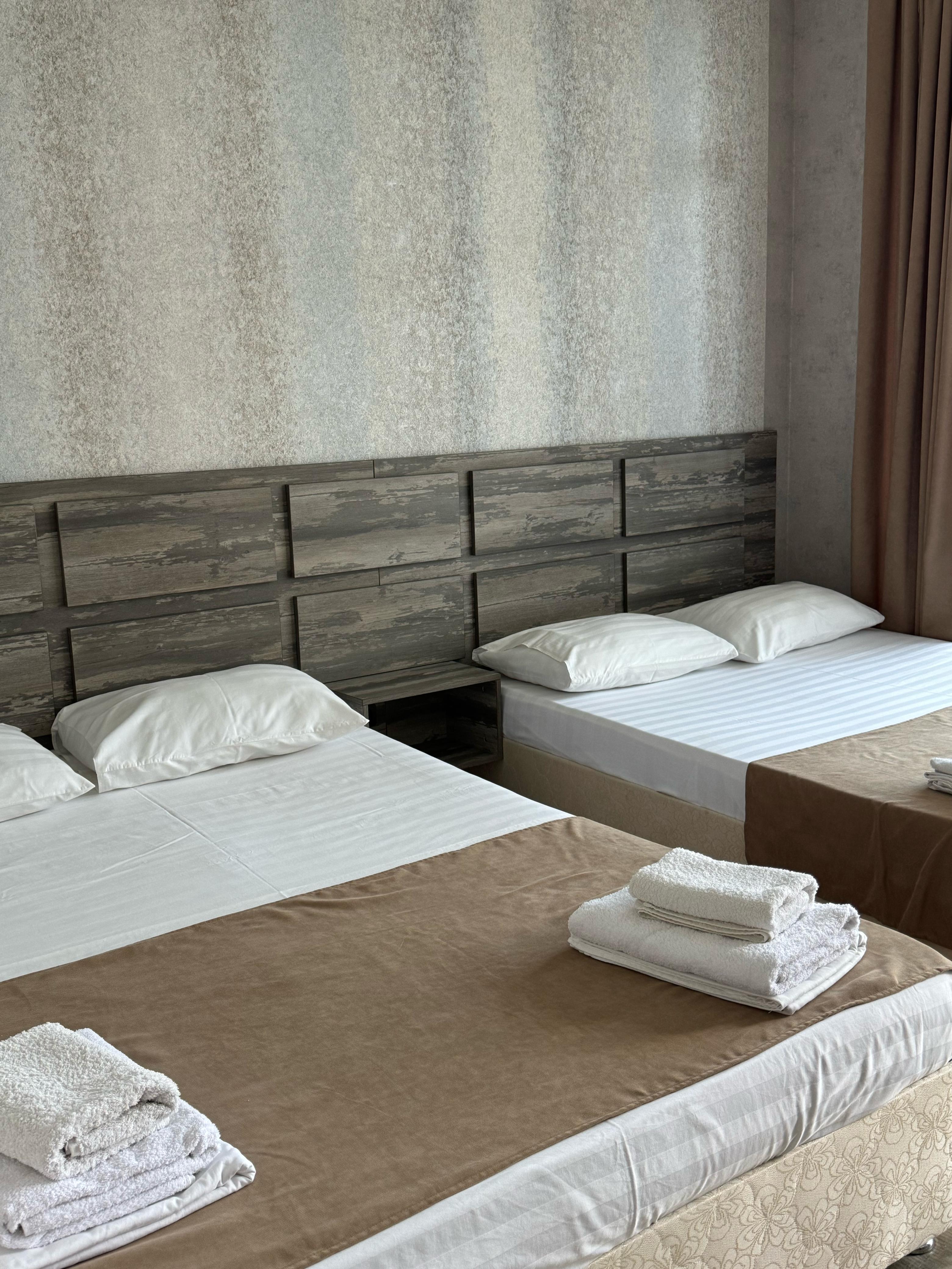 Четырехместный номер Делюкс