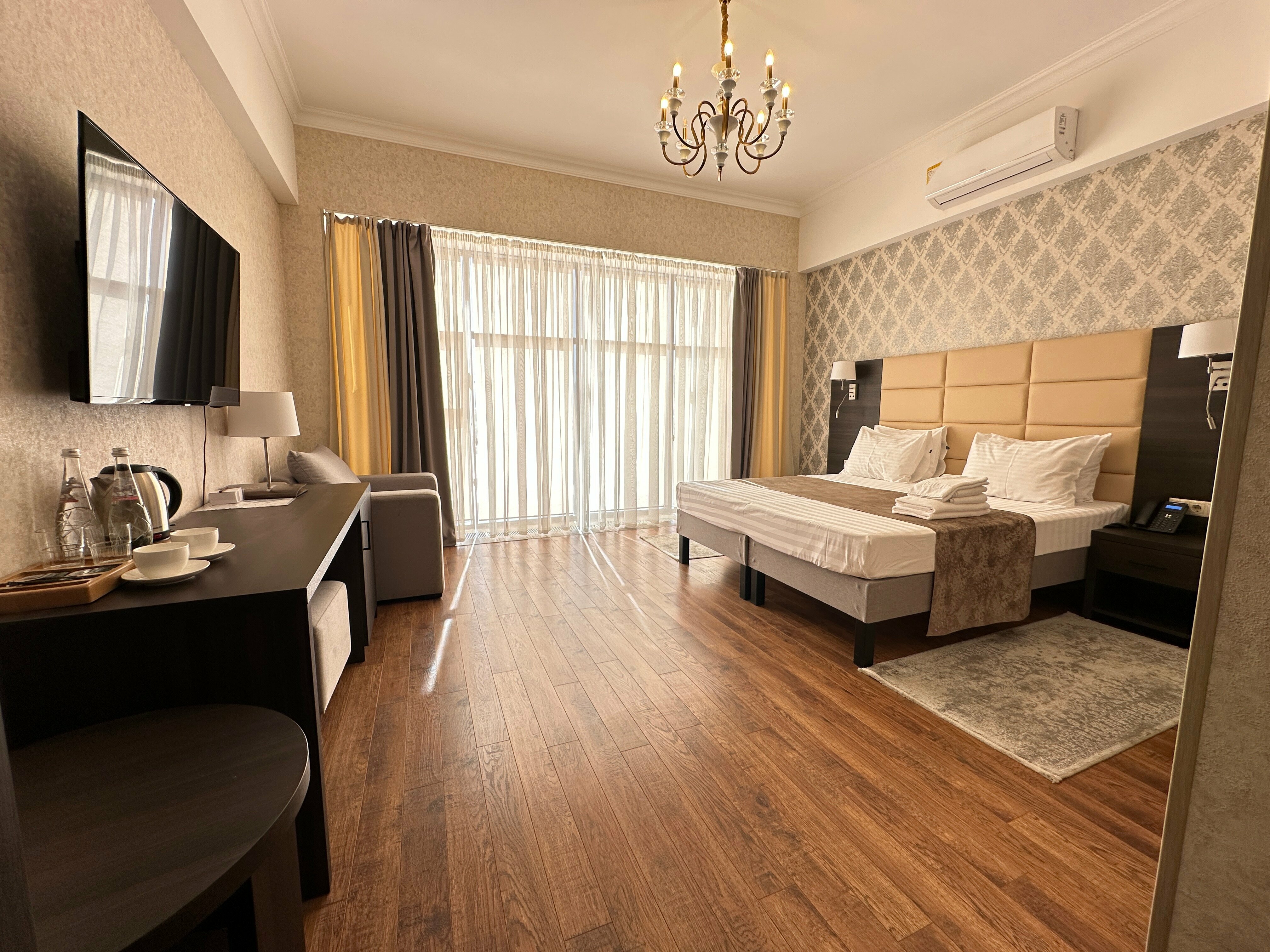 Улучшенный номер с кроватью размера «king-size» или 2 отдельными кроватями