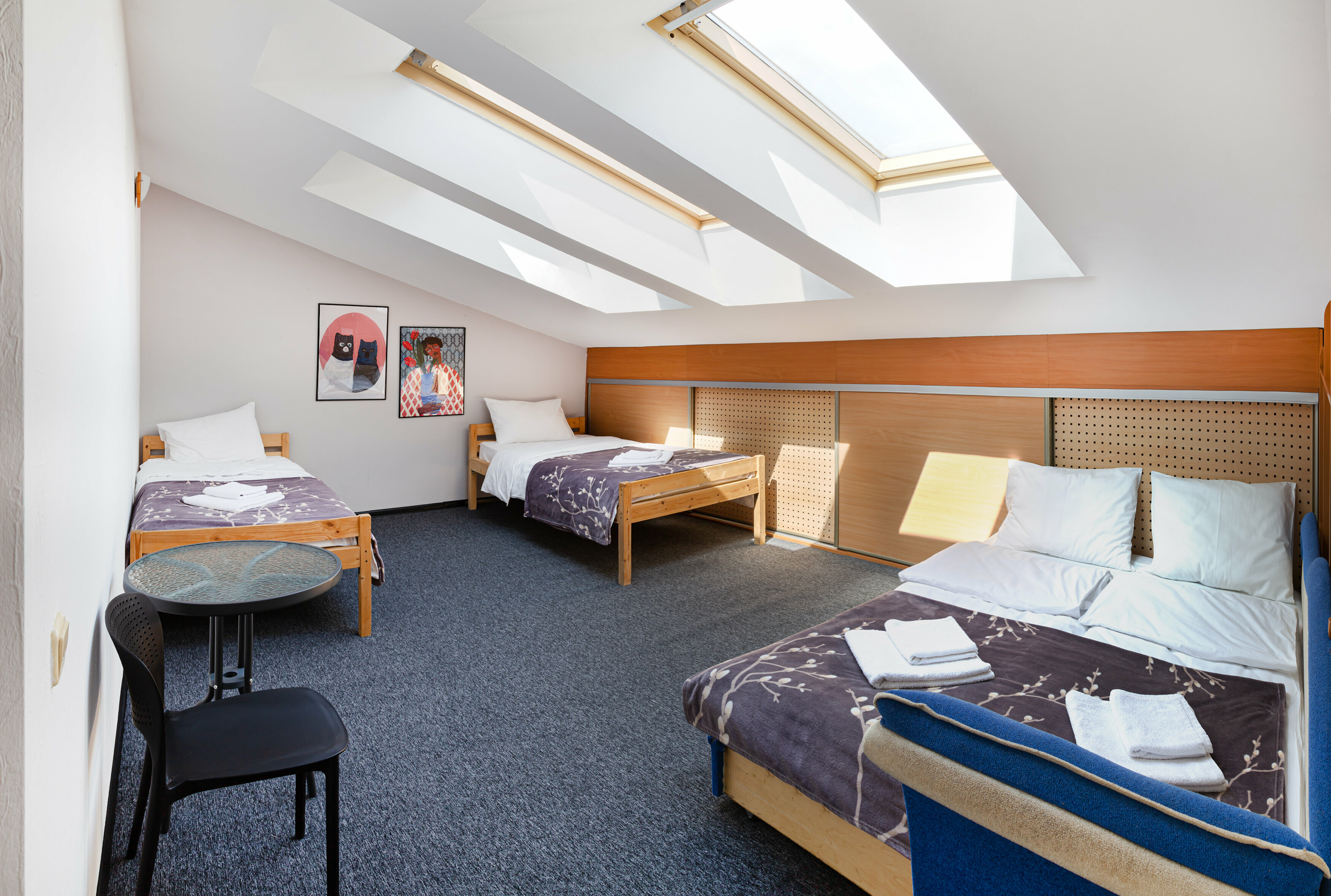 Четырехместный номер с общей ванной комнатой