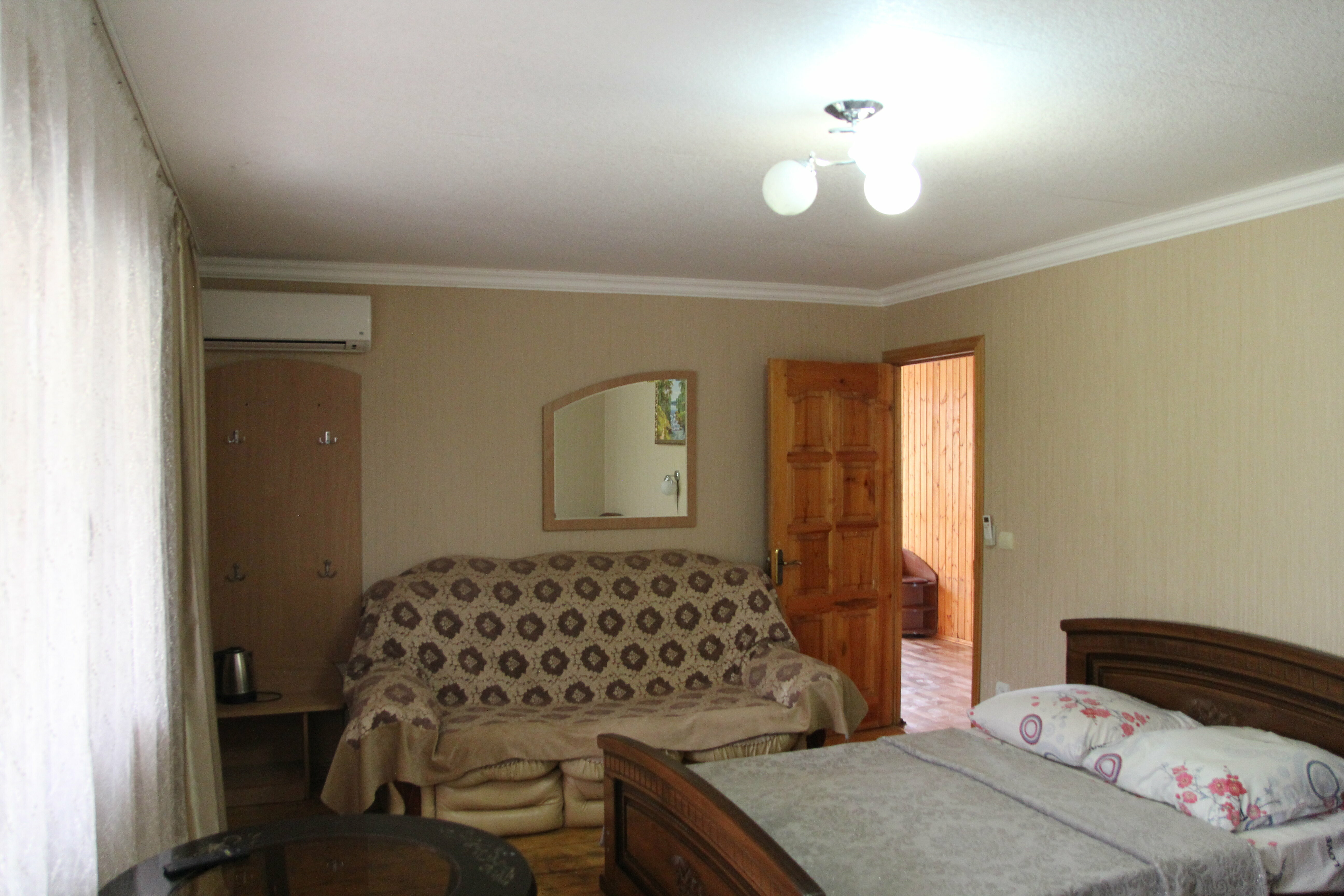 Четырехместный номер с балконом