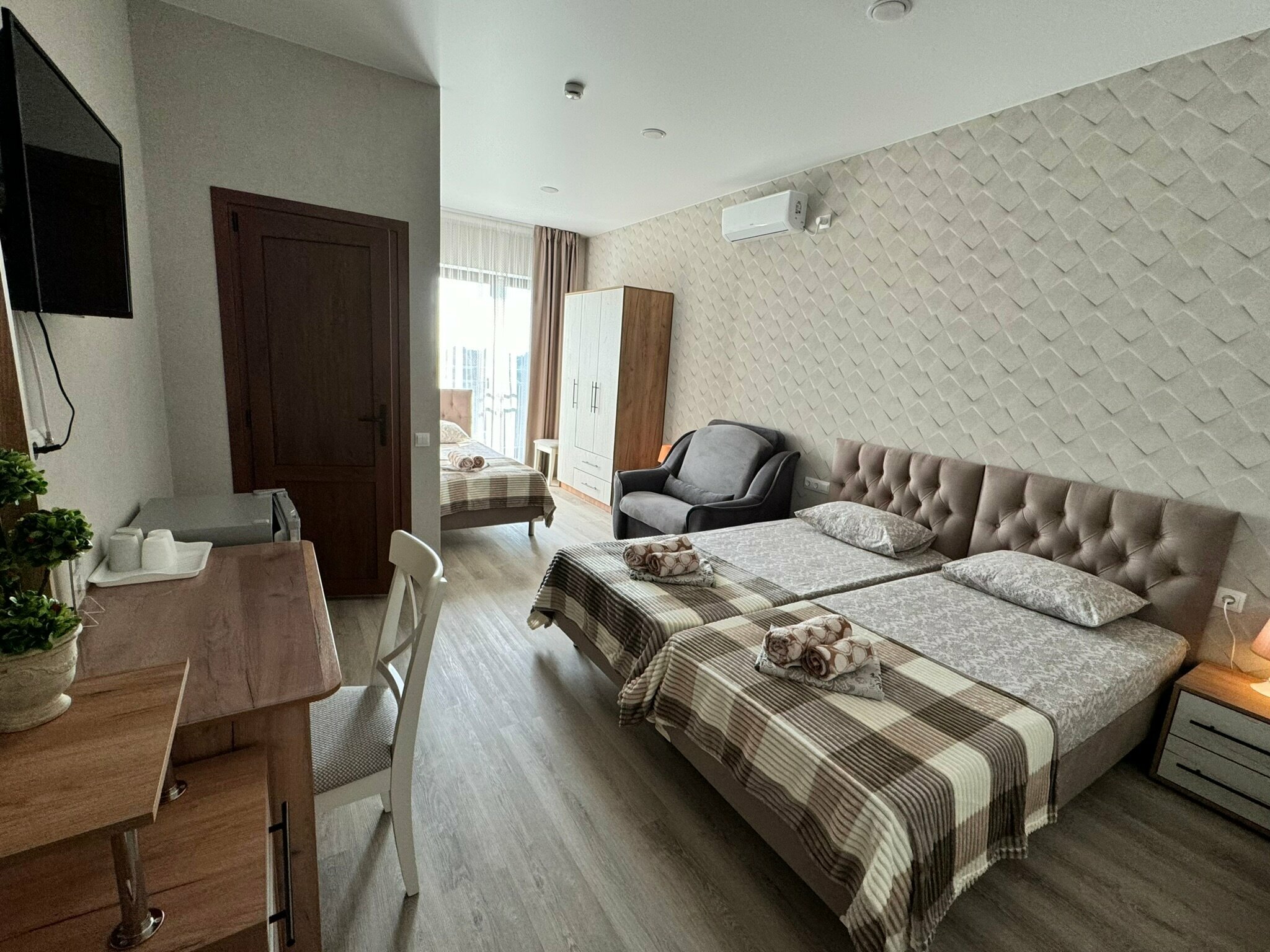 Четырехместный номер Делюкс