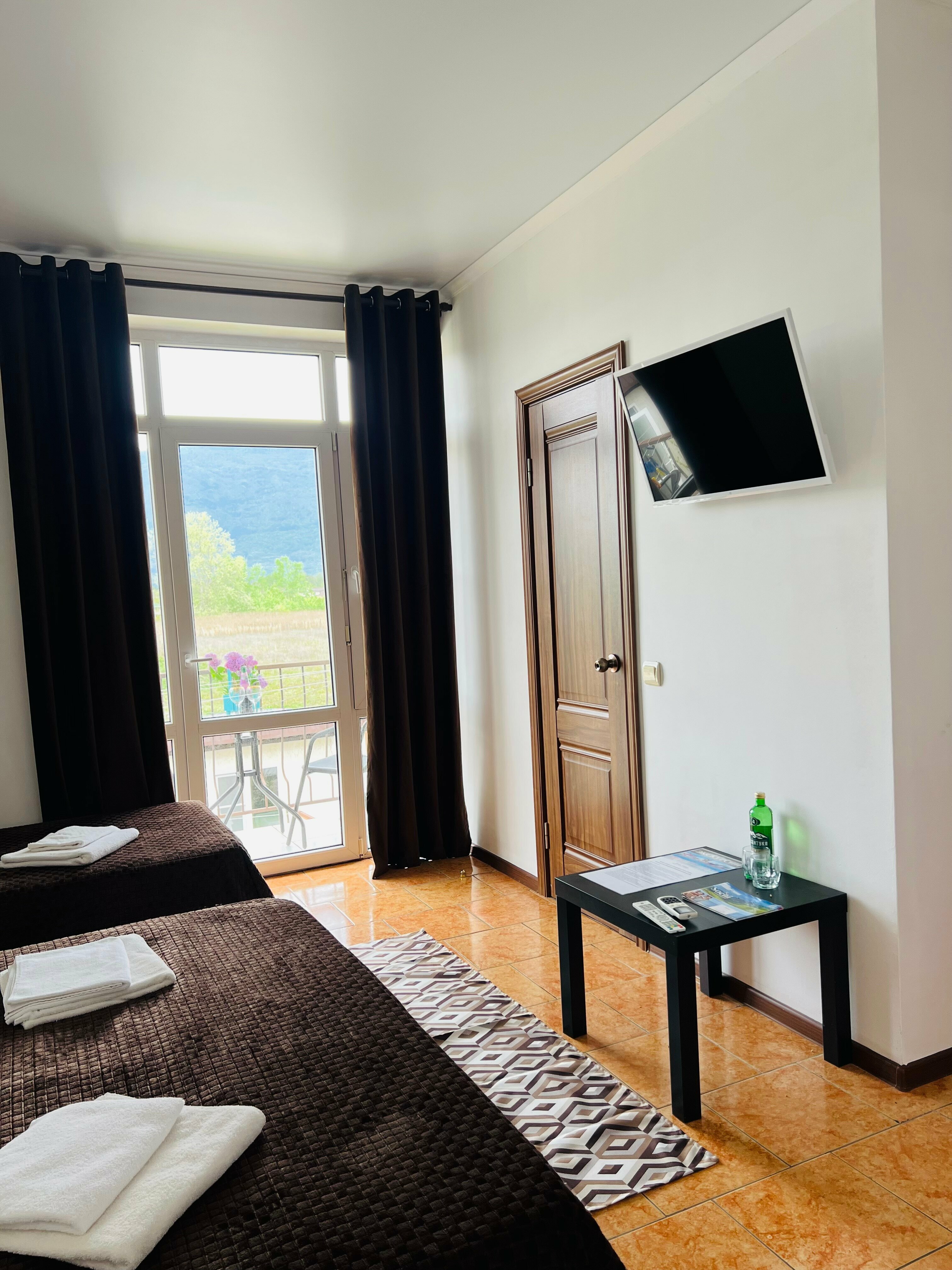 Трехместный номер с балконом