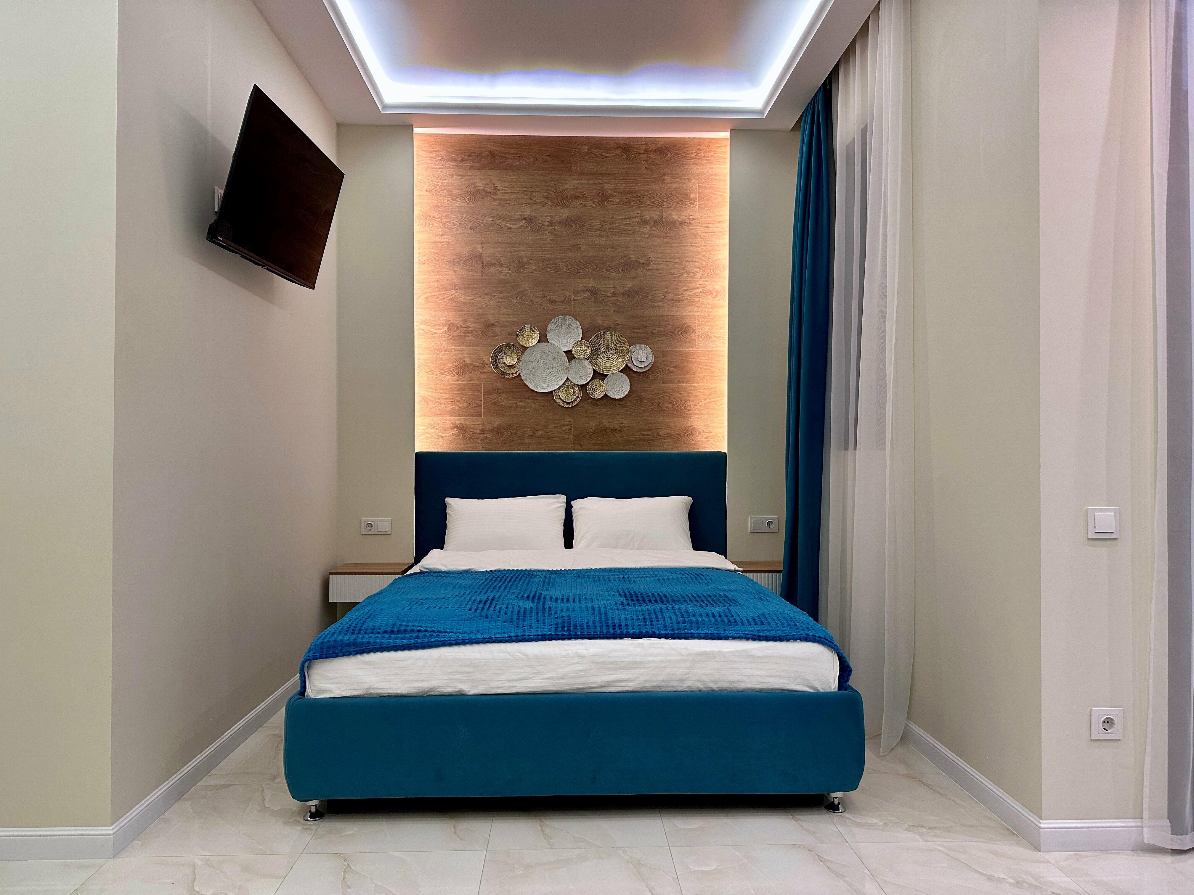 Апартаменты с видом на город и горы