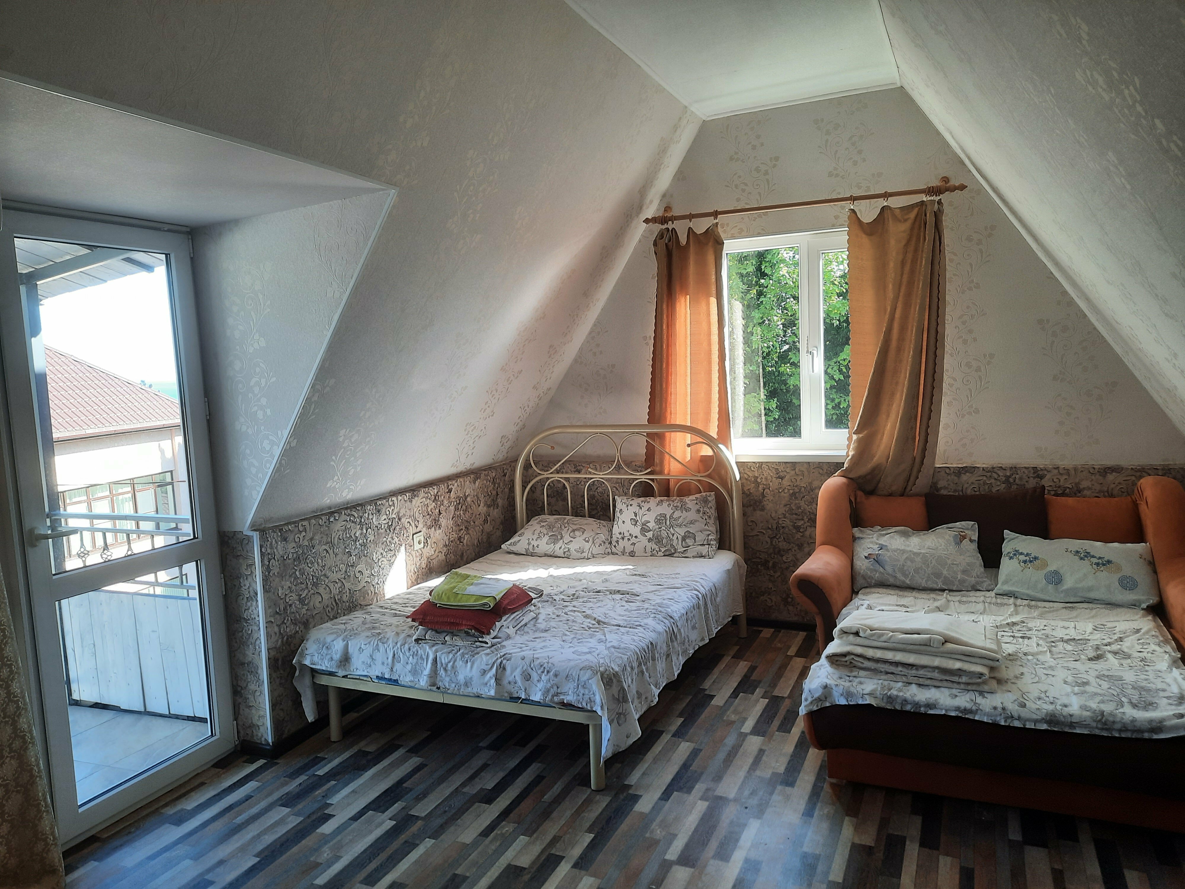 Мансарда с балконом