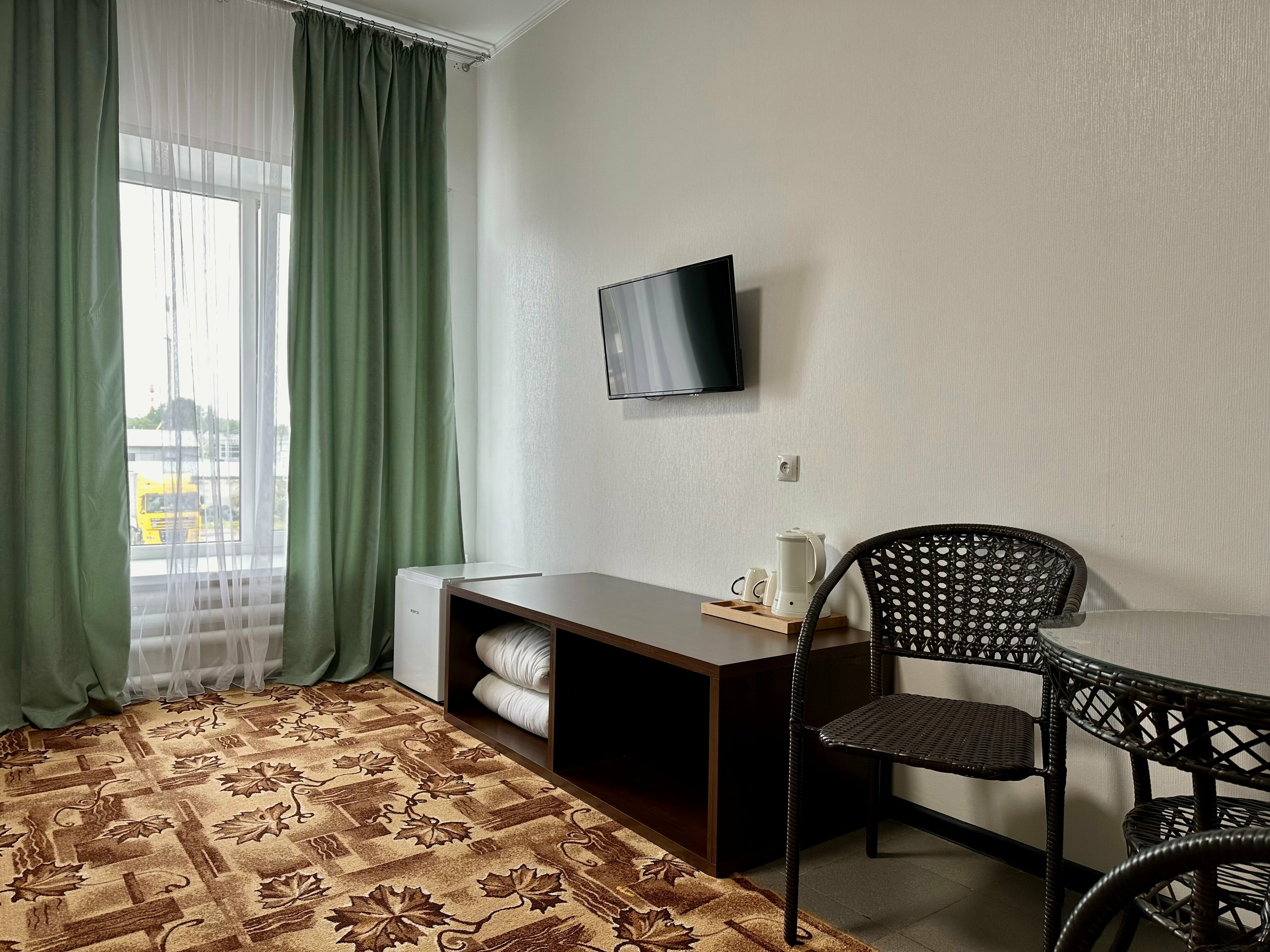 Улучшенный двухместный номер с 2 отдельными кроватями