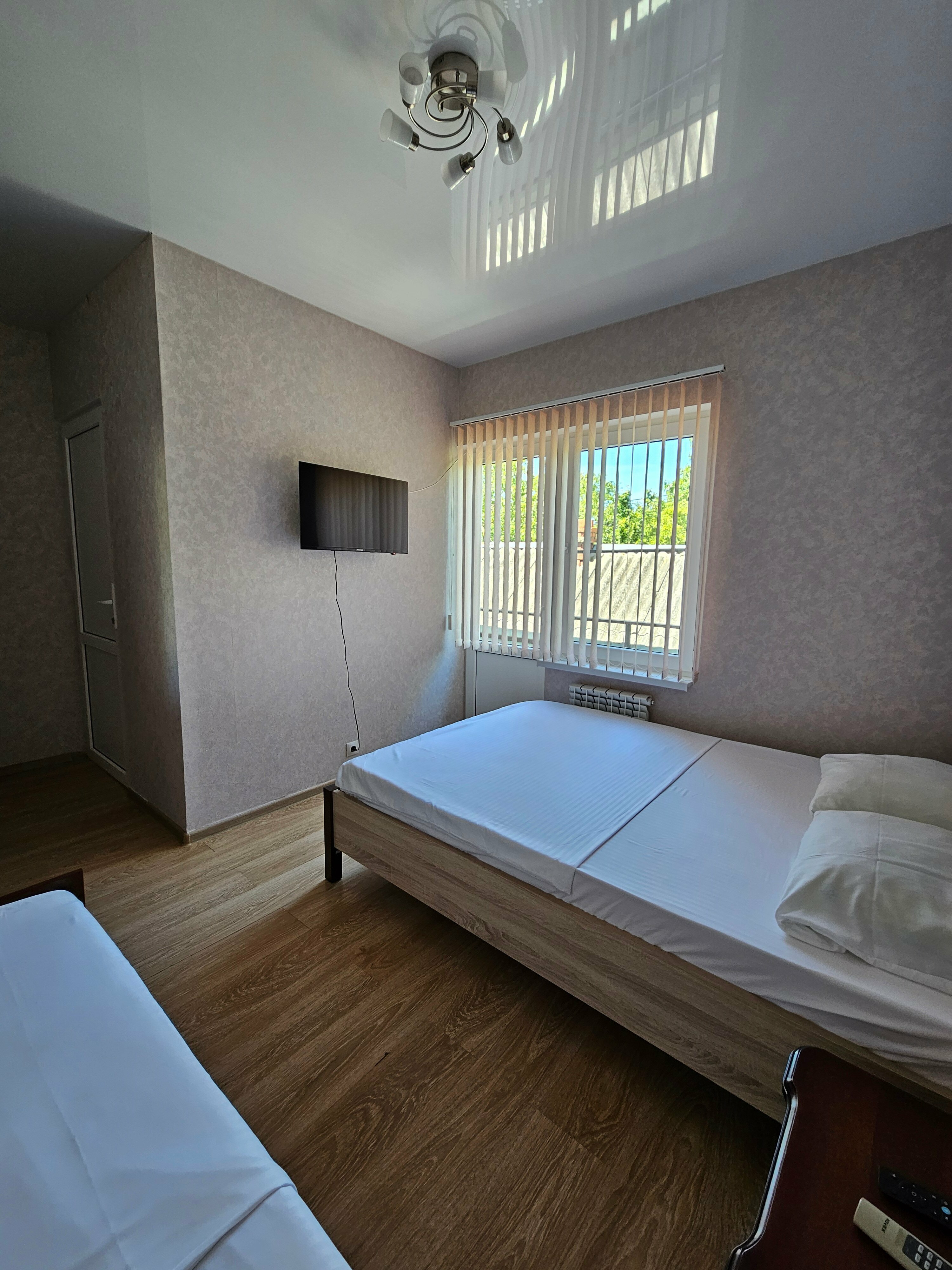 Трехместный номер с балконом