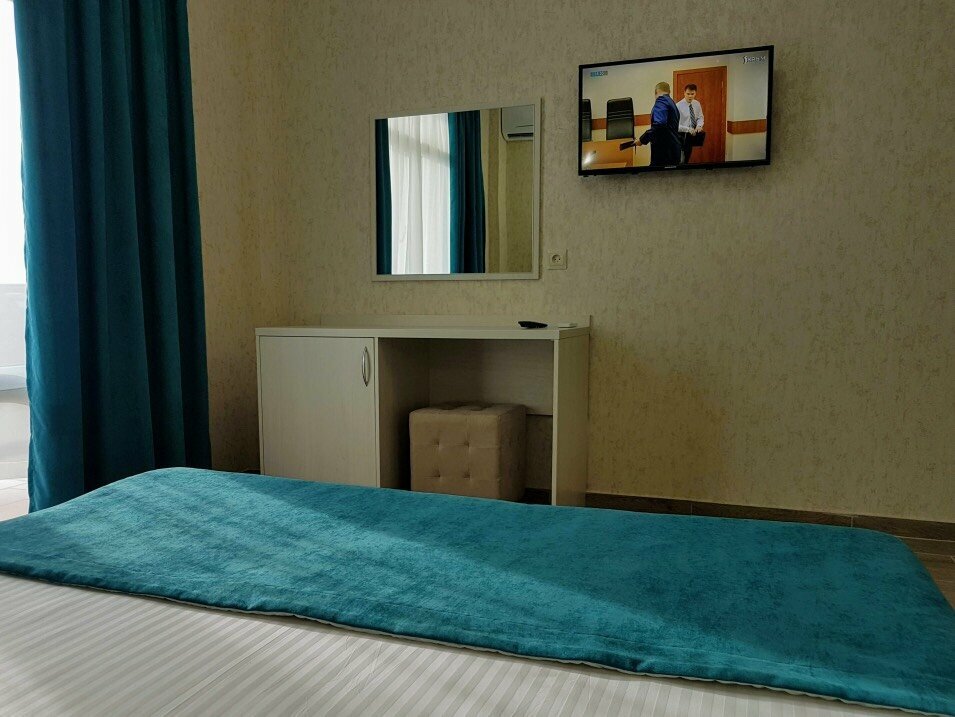 Трехместный номер с балконом