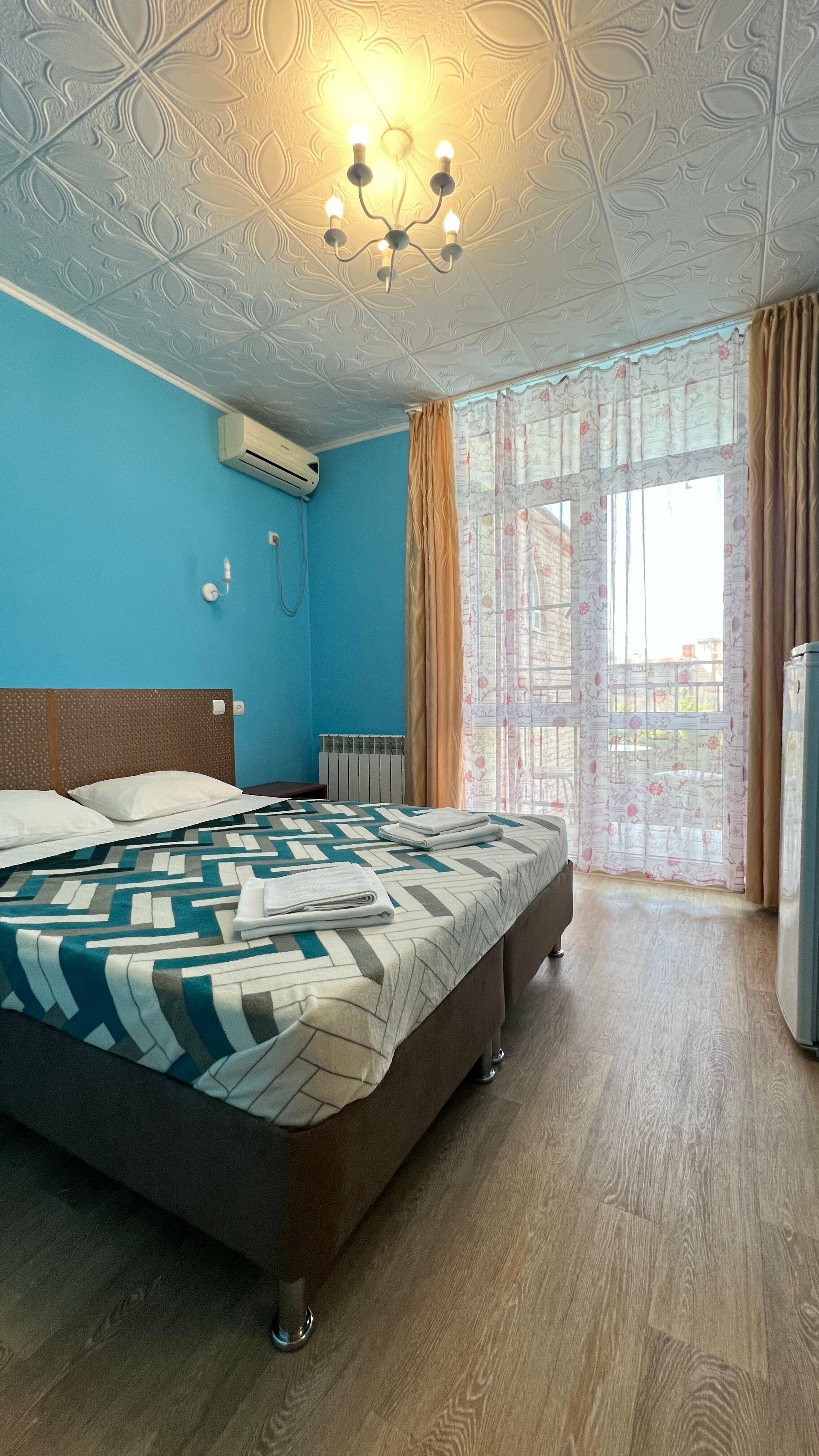 Четырехместный двухкомнатный номер с балконом на бассейн №1