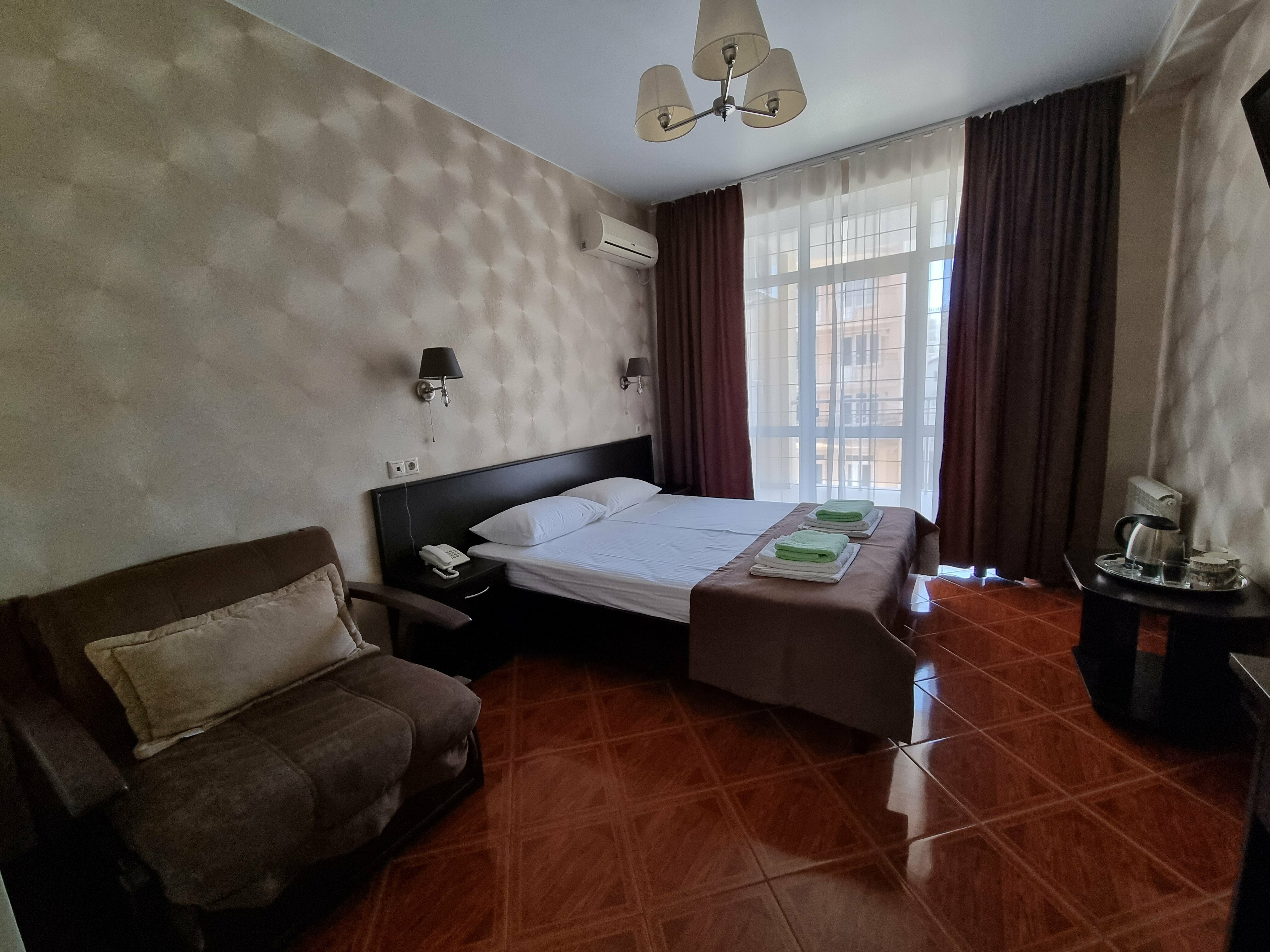 Двухместный номер с 1 кроватью или 2 отдельными кроватями и балконом