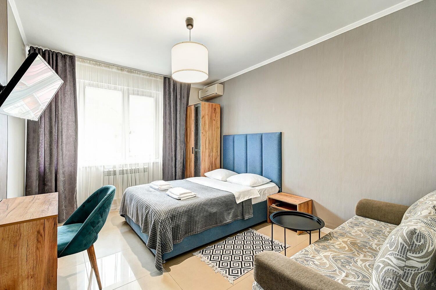 Трехместный номер с балконом