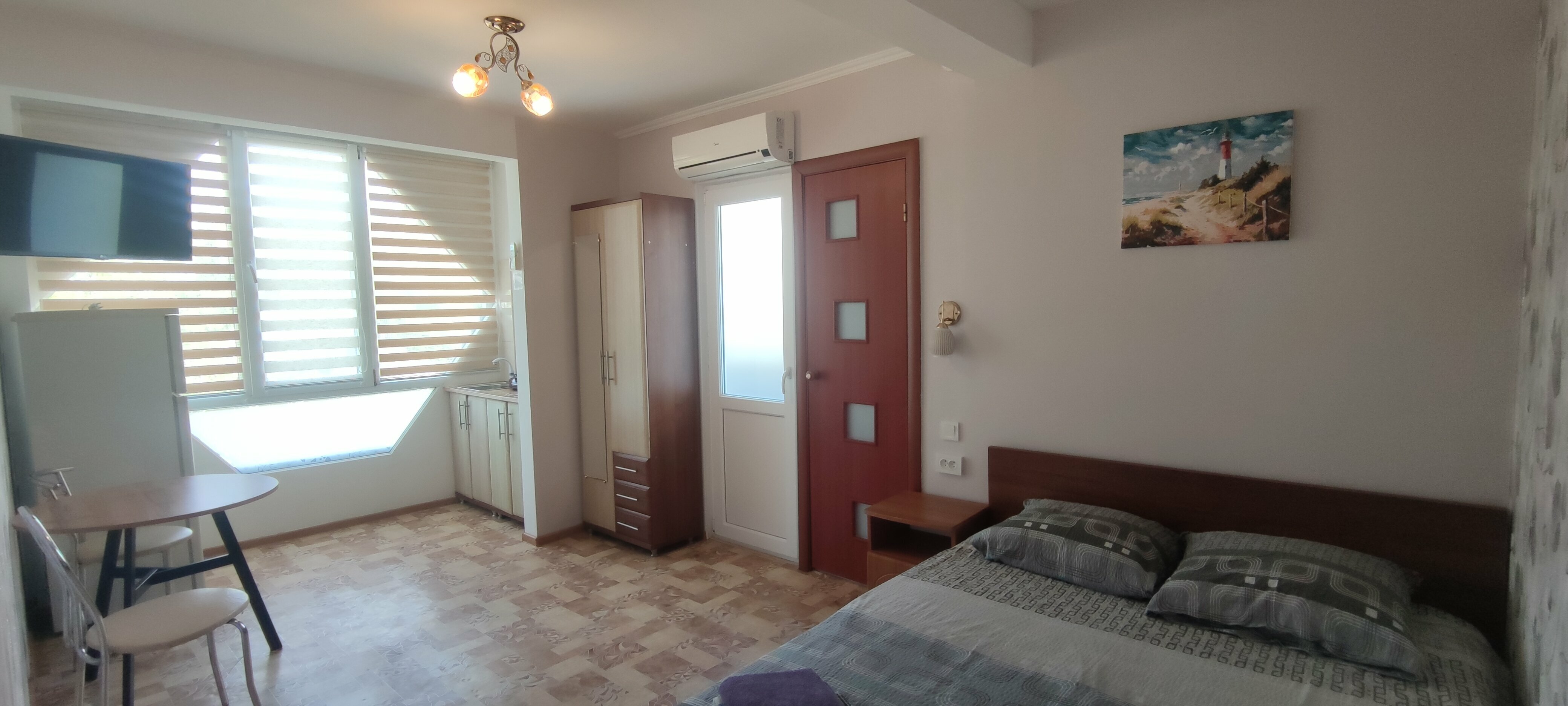 Двухместный номер с балконом и кухней