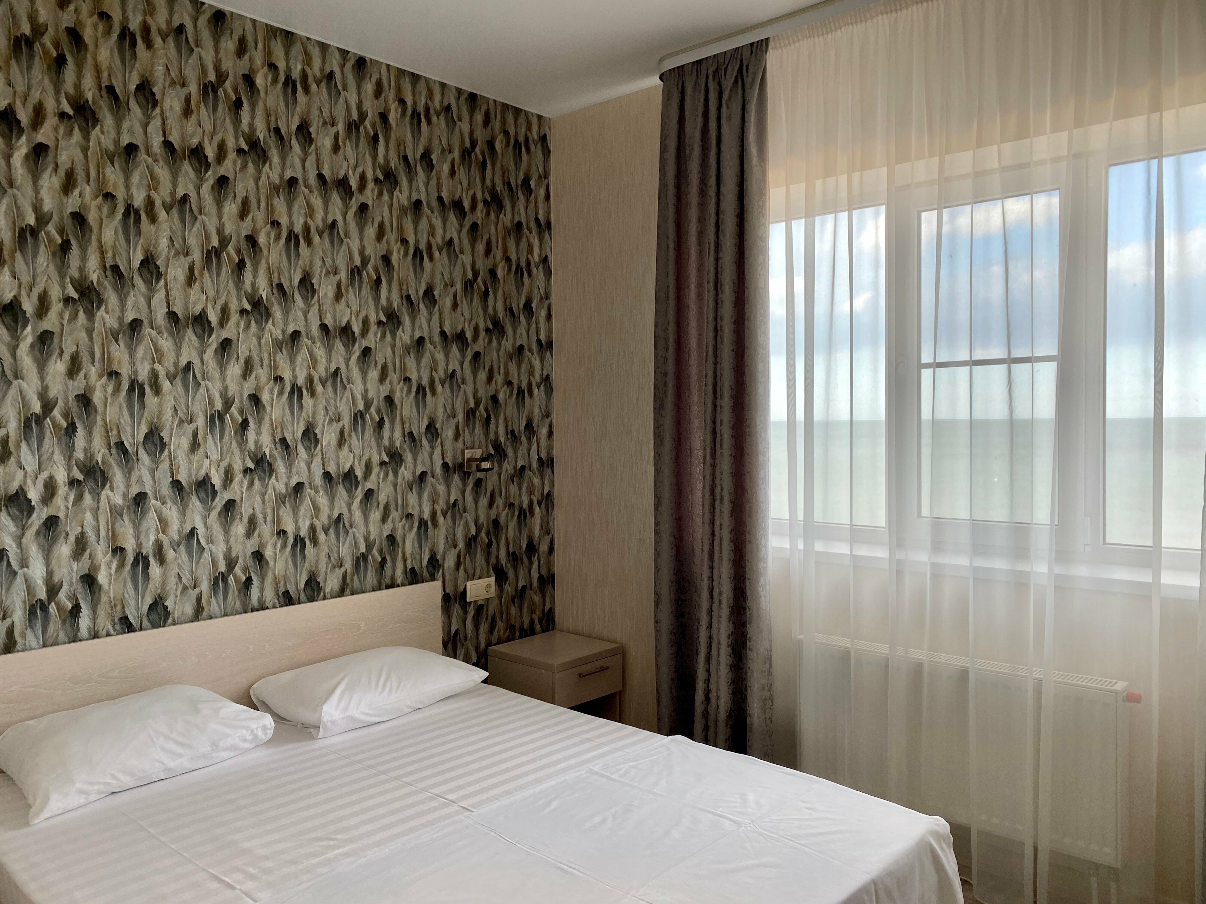 Делюкс с кухней и видом на море семейный