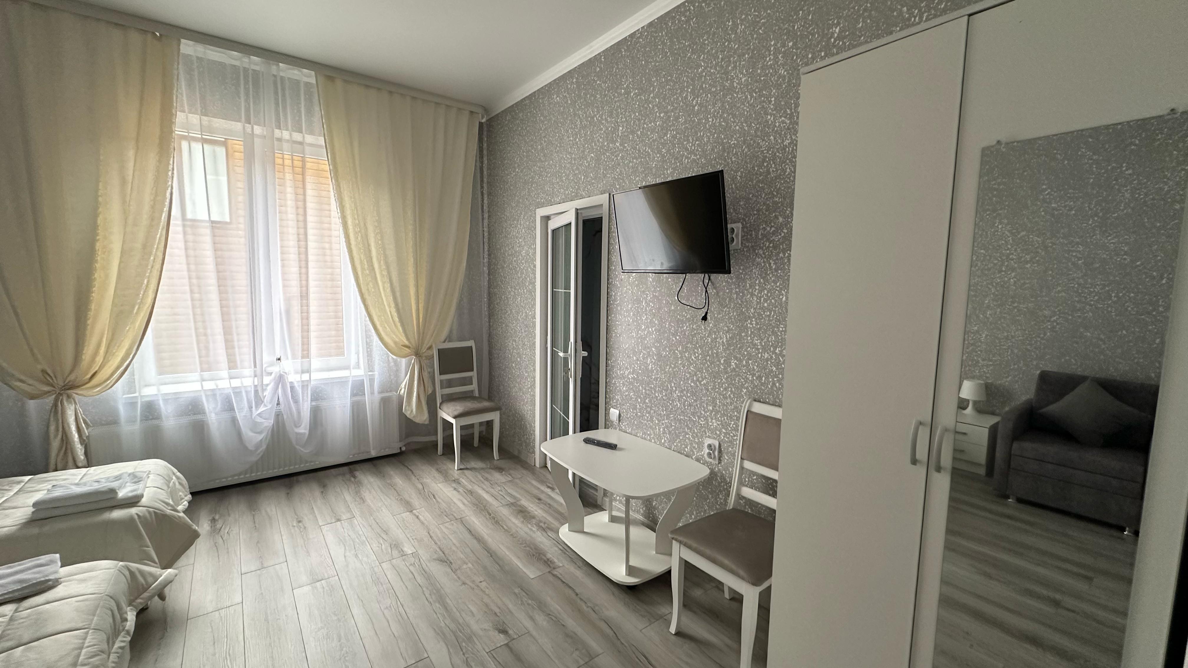 Трехместный номер Делюкс