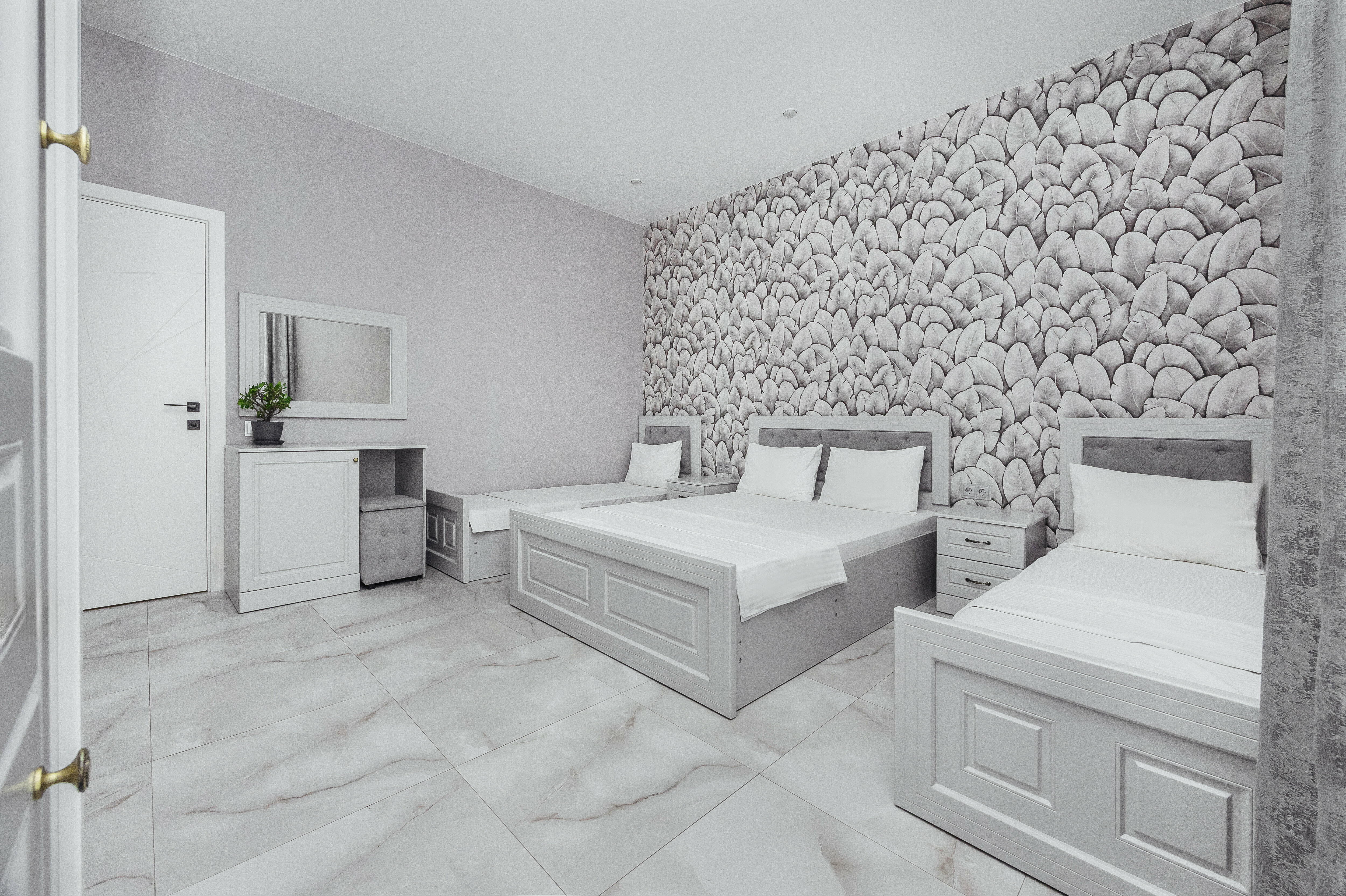 Четырехместный номер Делюкс