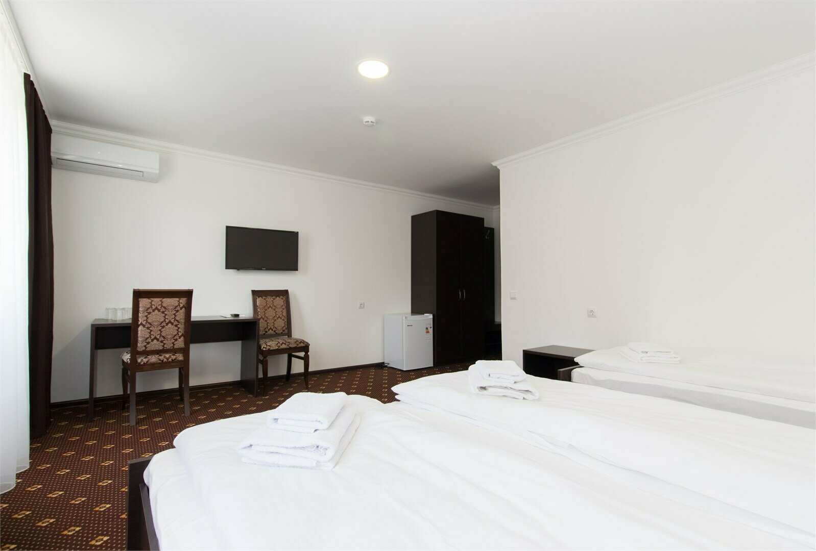 Улучшенный трехместный номер