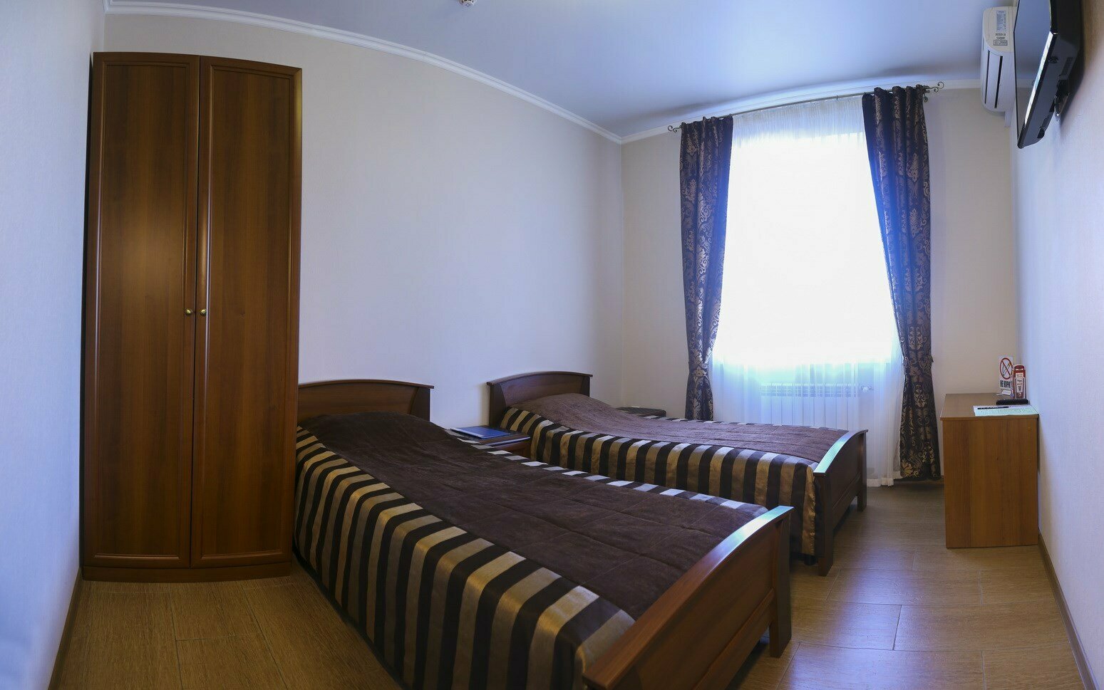 Улучшенный двухместный номер с 2 отдельными кроватями