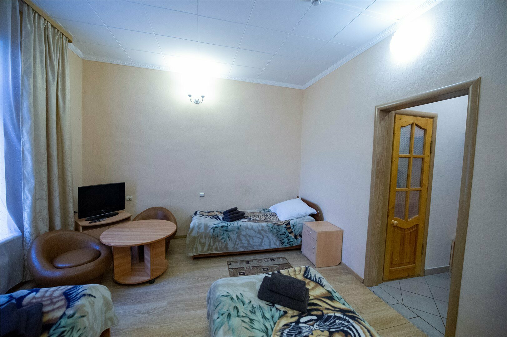 Стандартный трехместный номер с тремя кроватями