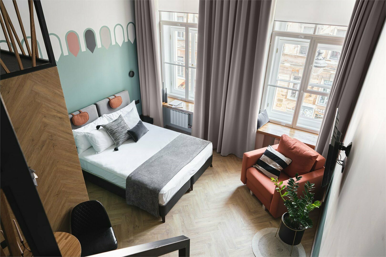 Двухуровневый номер-студио Делюкс