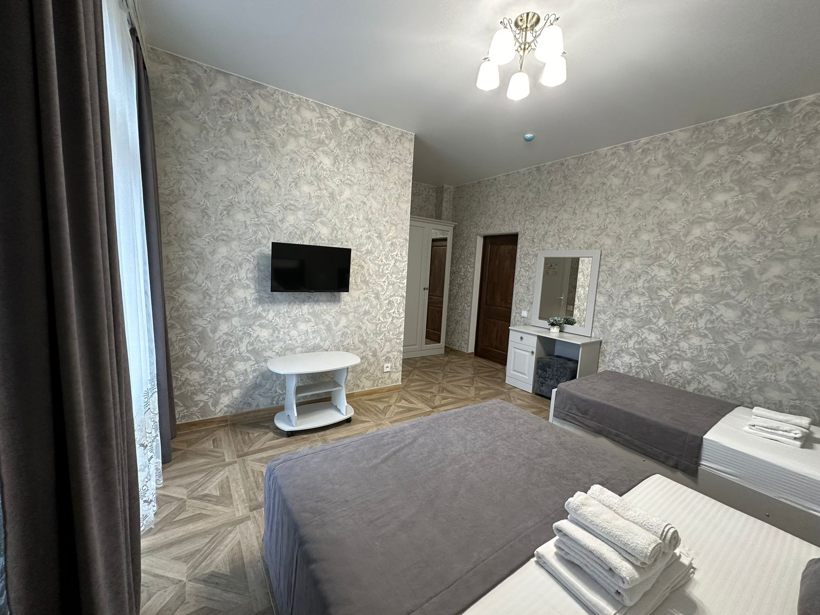 Улучшенный трехместный номер