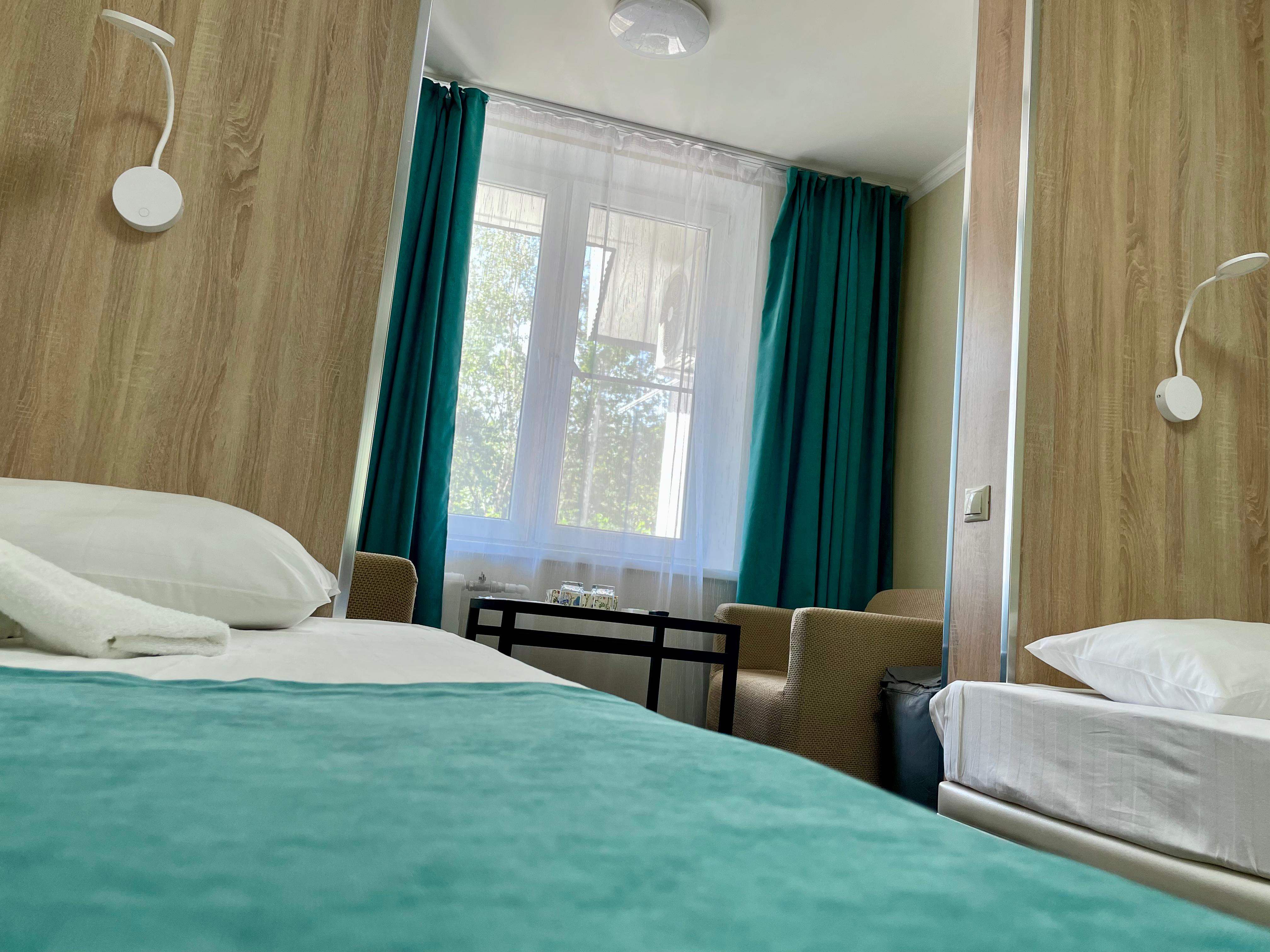 Улучшенный двухместный номер с 2 отдельными кроватями