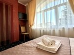 Номера Люкс без балкона с одной совместной кроватью с видом во двор в Империал 2011