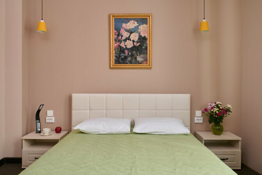 Двухместный номер с двуспальной кроватью и дополнительной кроватью