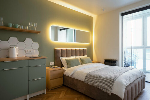 Студия "Оливковая" с балконом и качелью