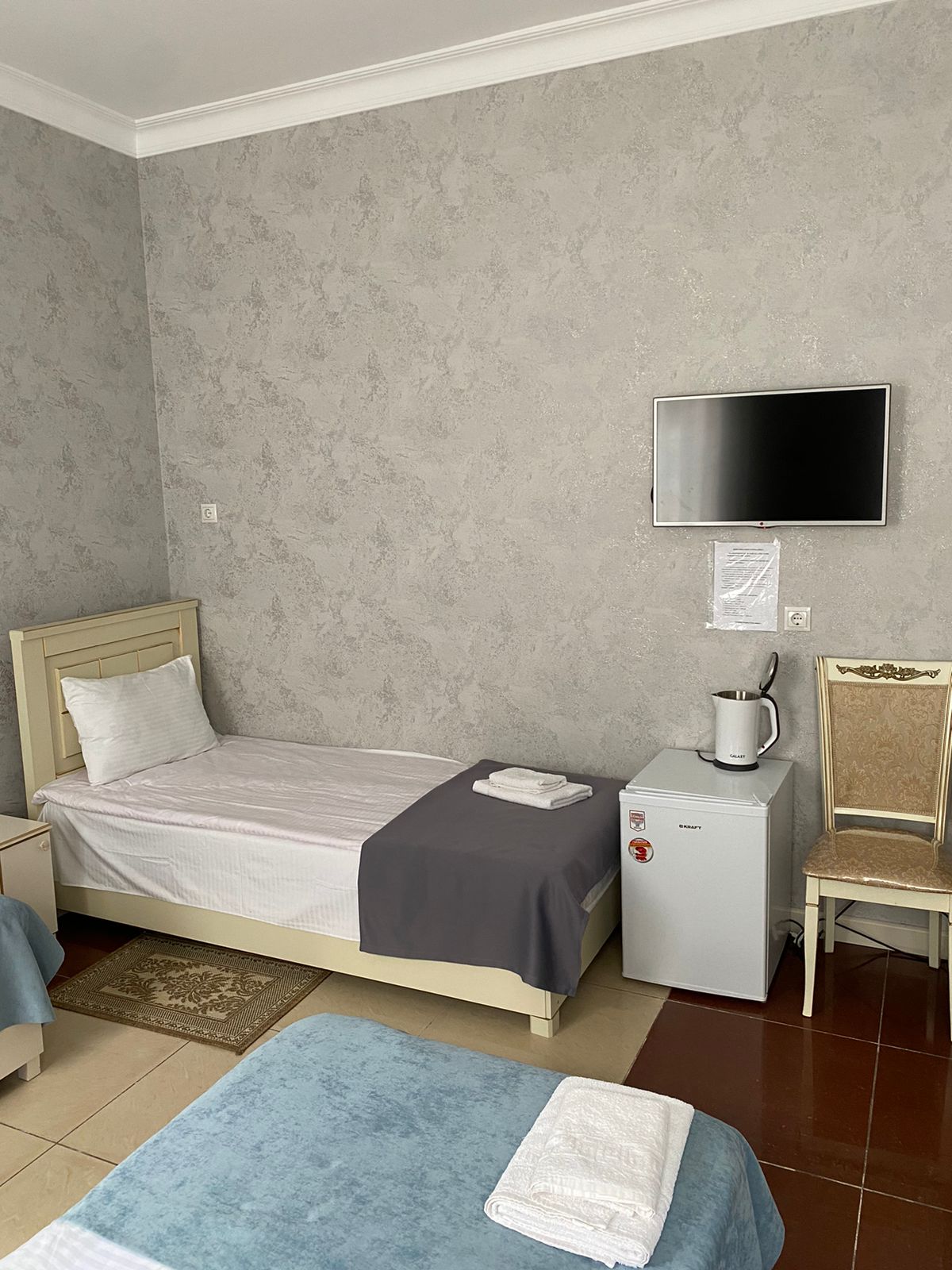 Четырехместный номер с ванной комнатой