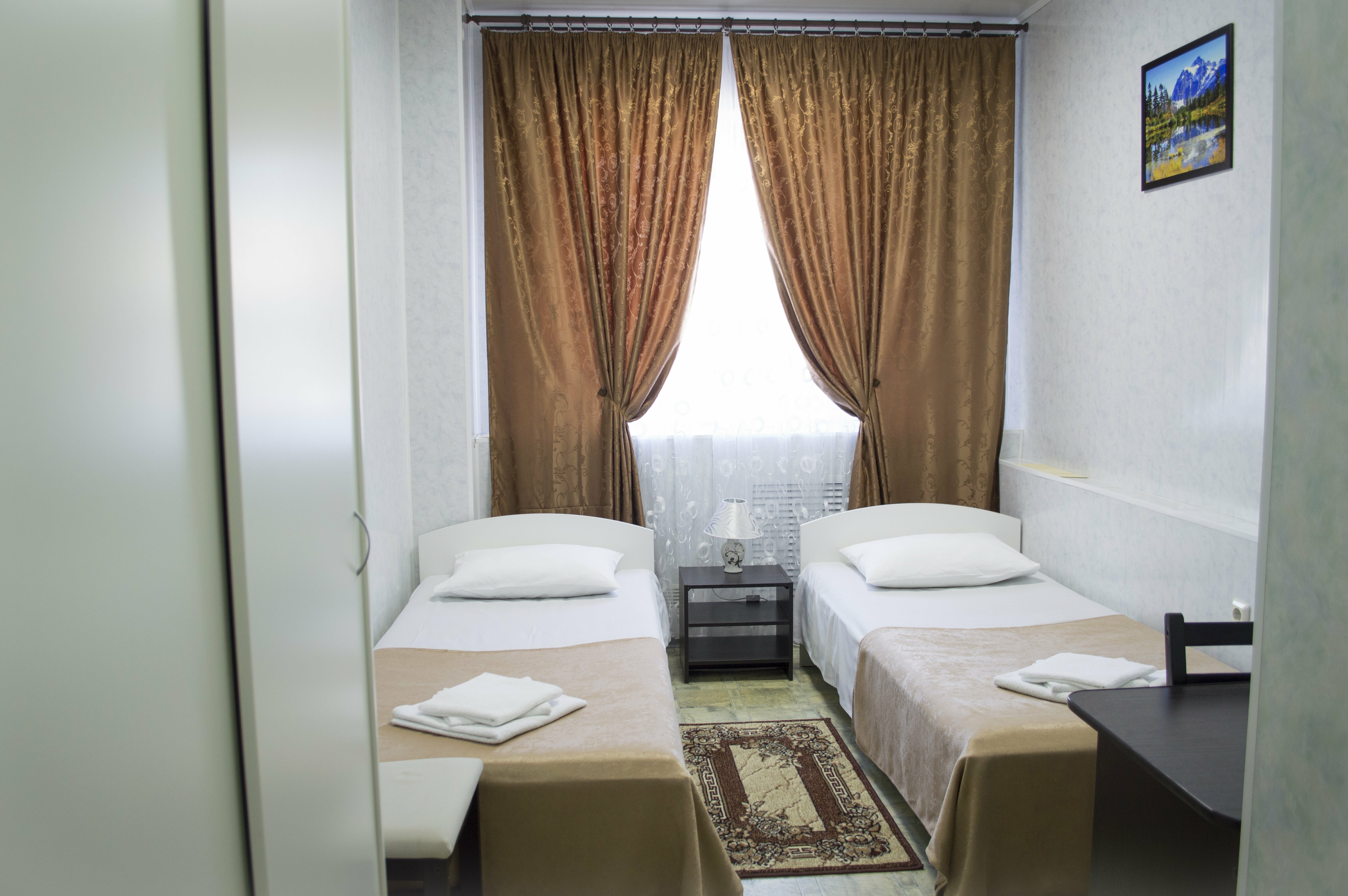 Двухместный номер с 2 отдельными кроватями и душем