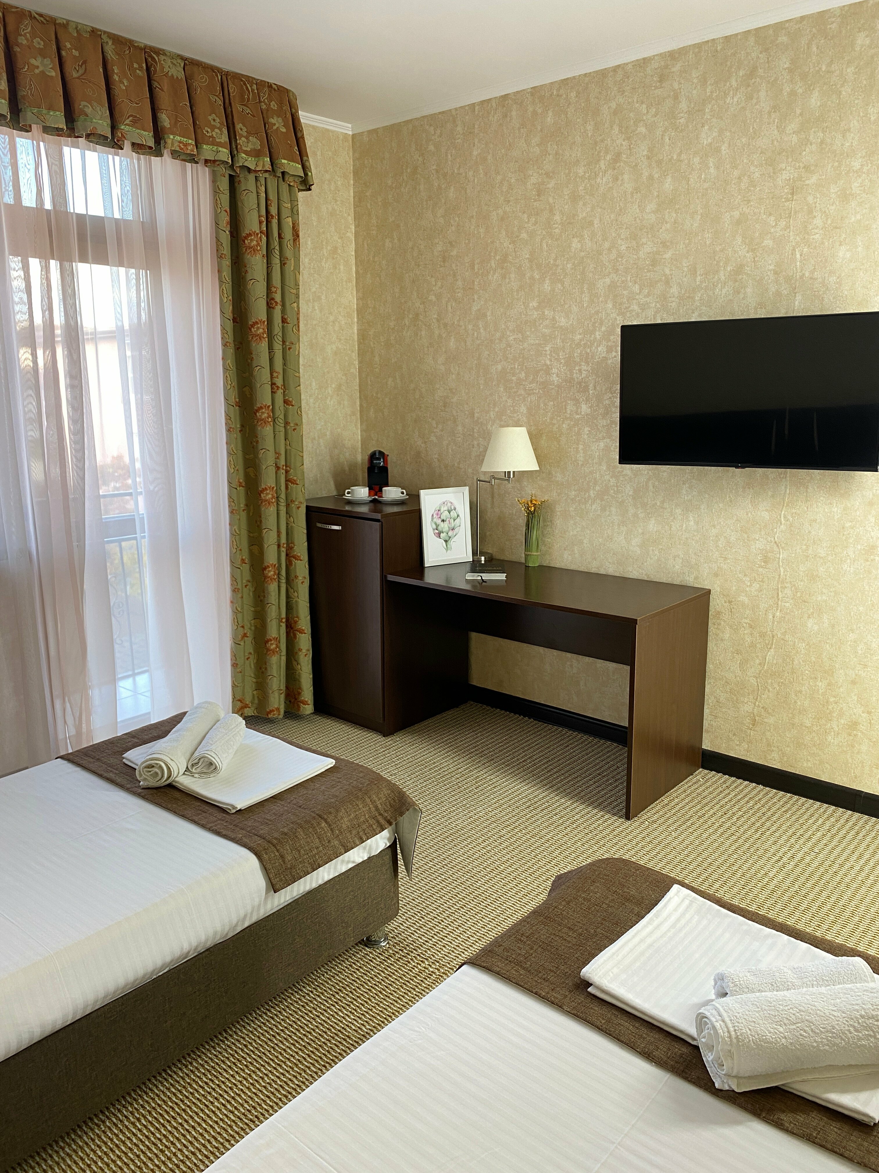 Двухместный номер с 2 отдельными кроватями и балконом