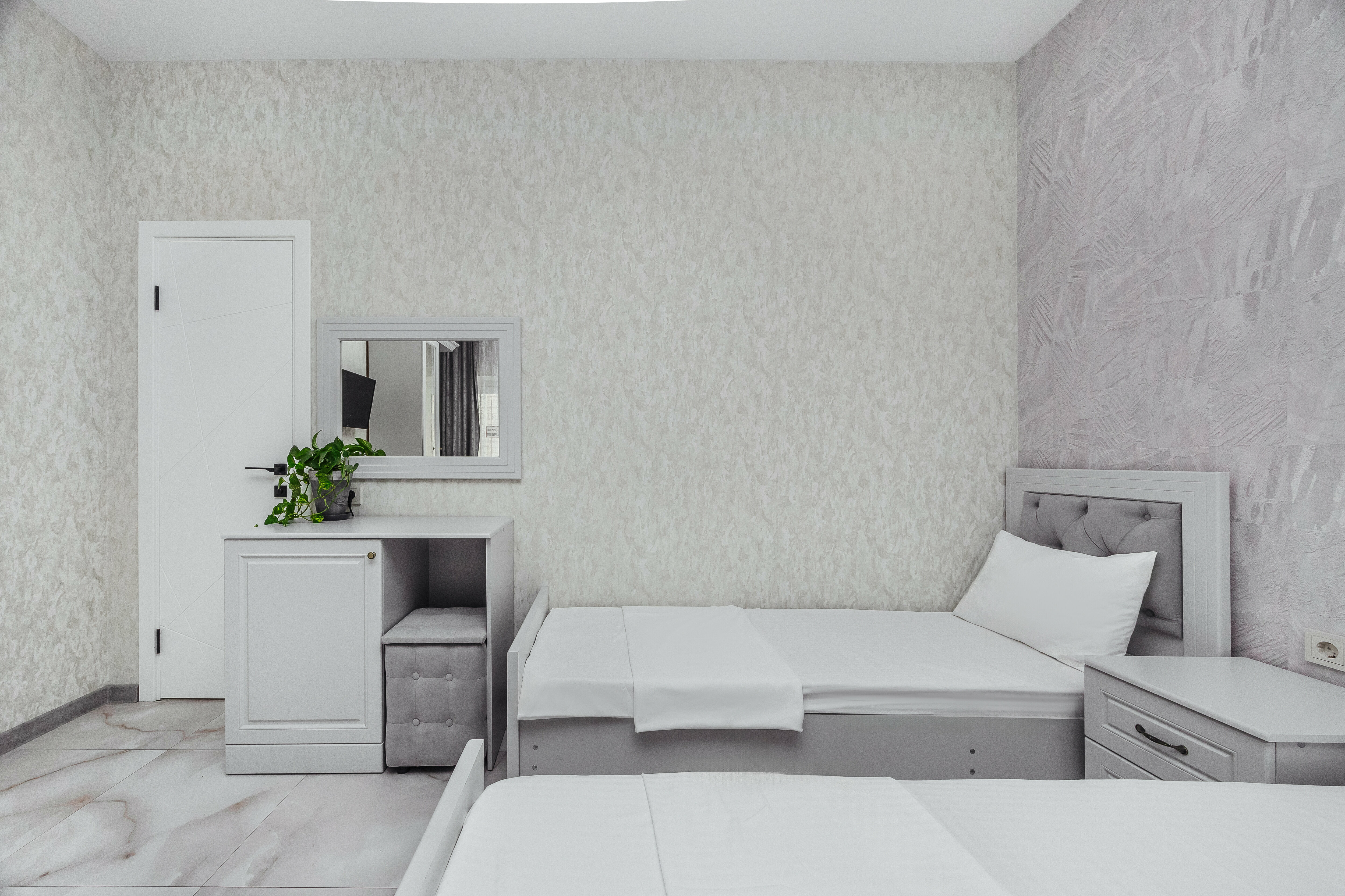 Четырехместный номер Делюкс