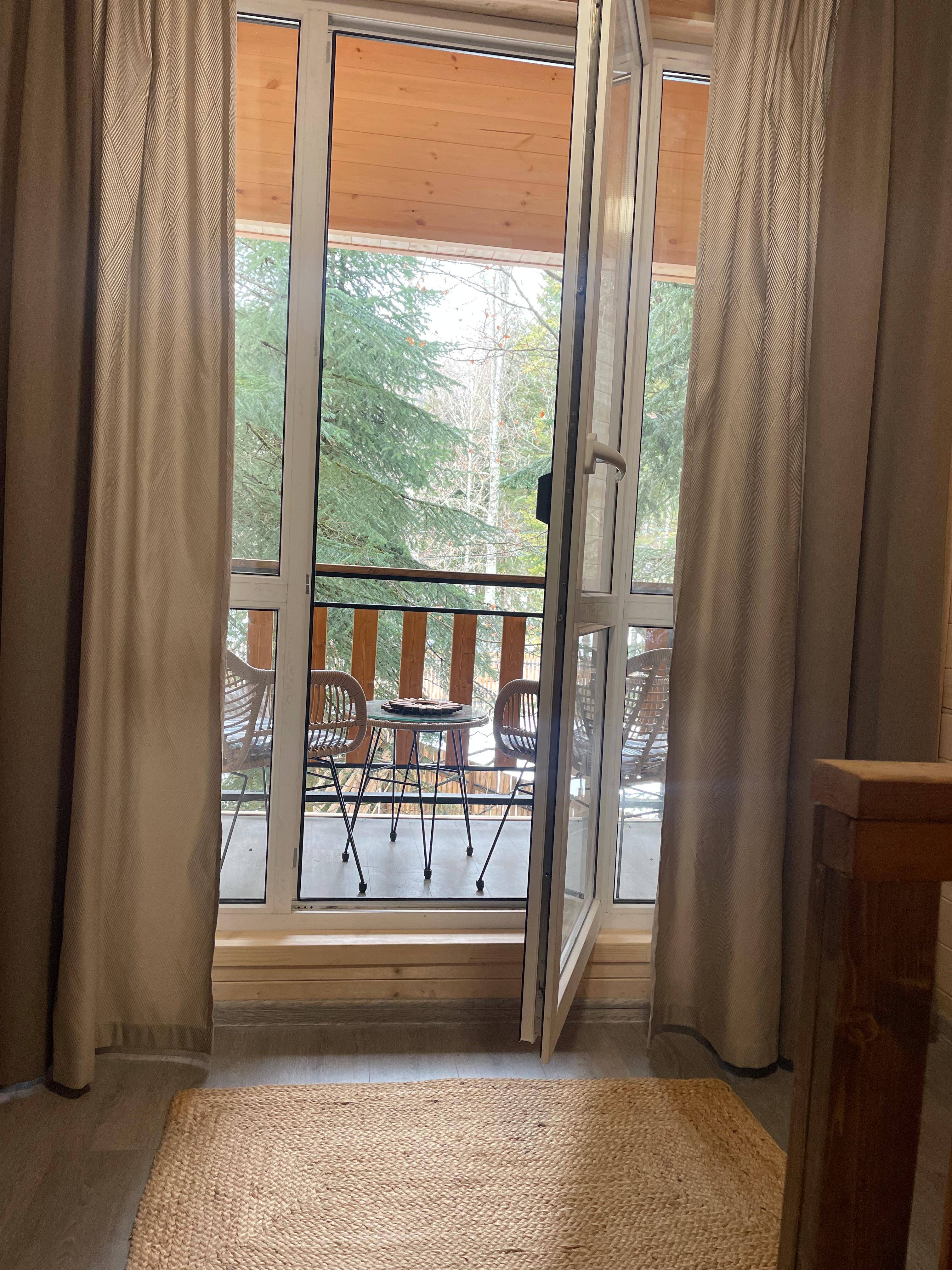 Коттедж с балконом