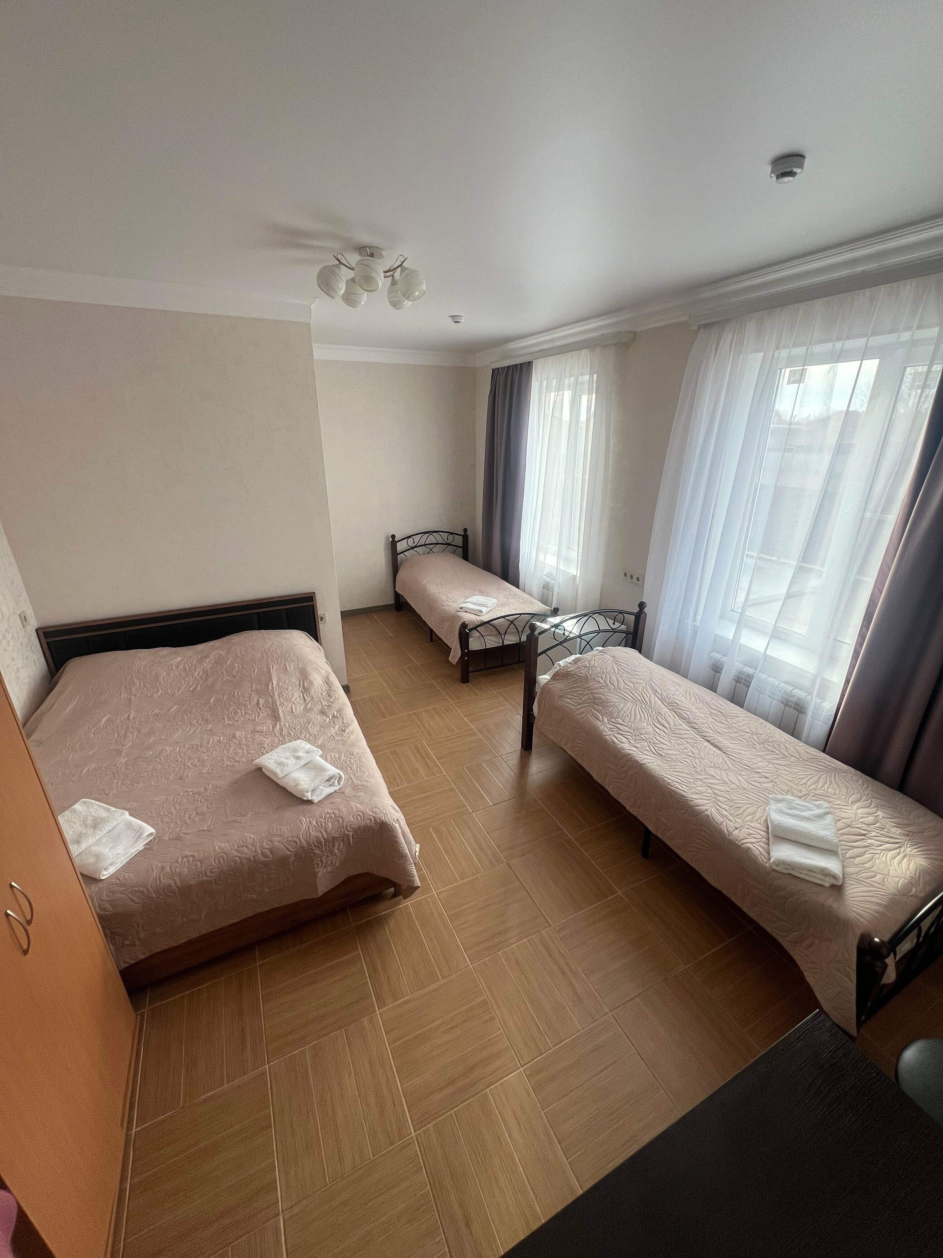 Улучшенный четырехместный номер