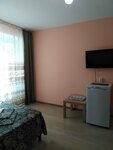 Четырехместный номер с собственной ванной комнатой вне номера в Гостевой дом на Луговой 13