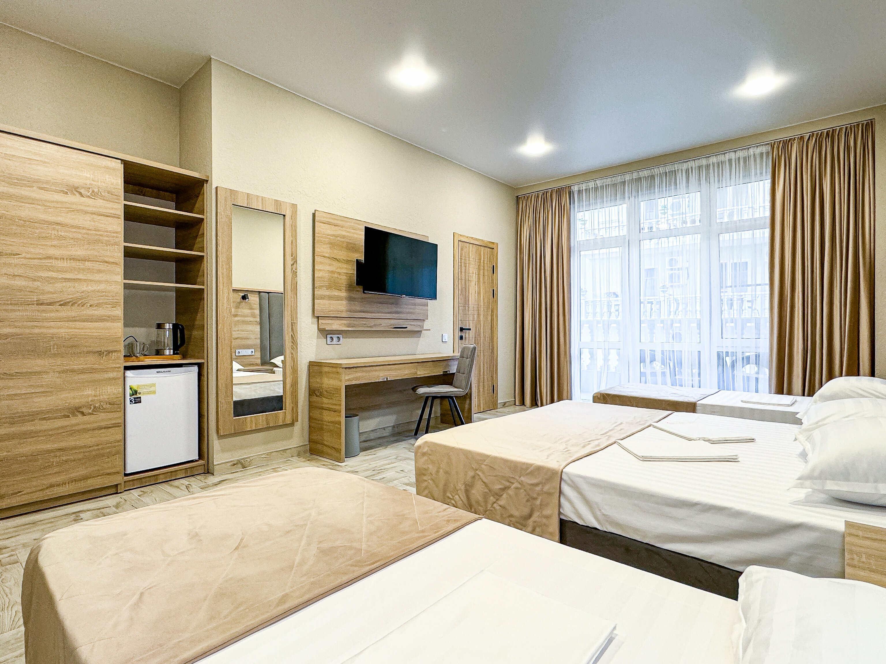 Четырехместный номер Делюкс