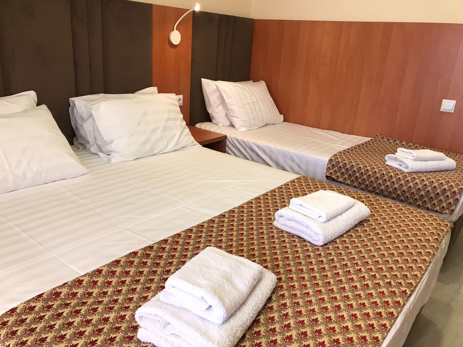 Трехместный номер с балконом