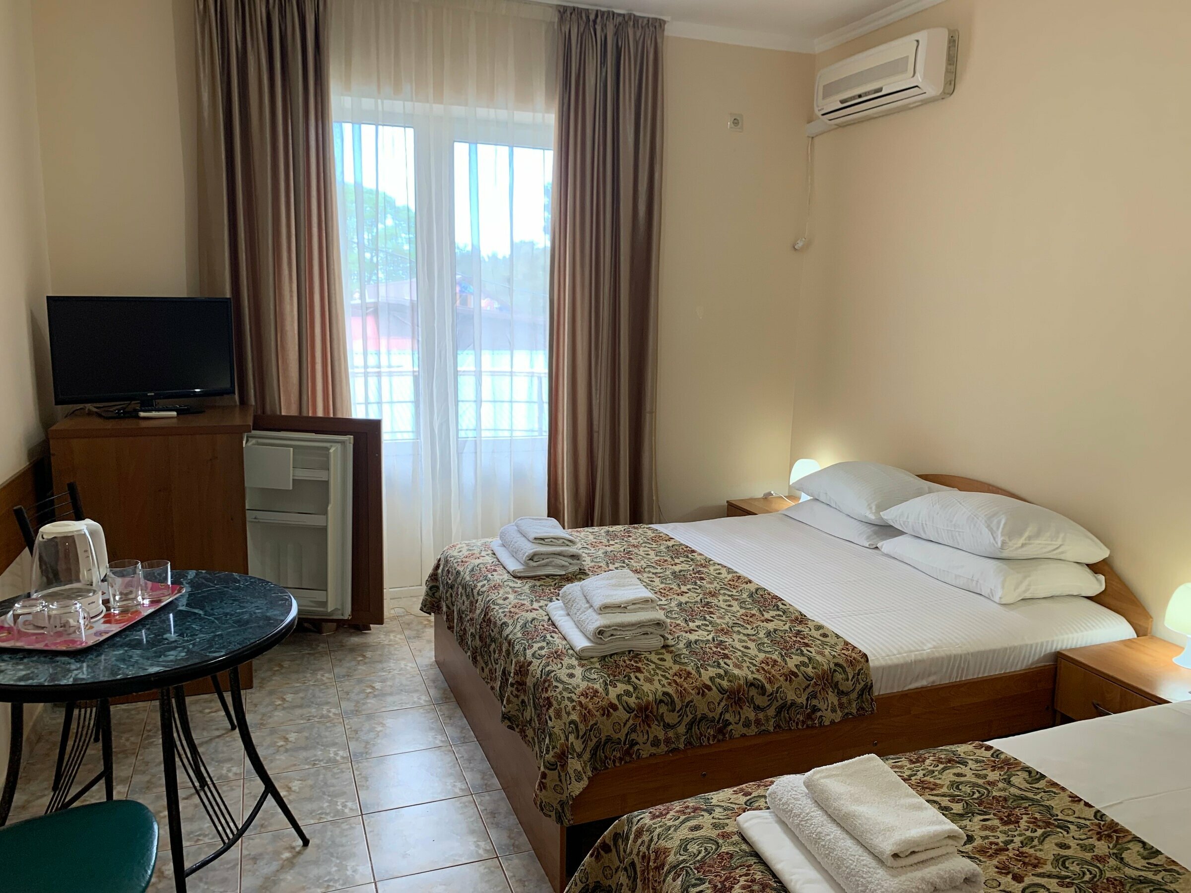 Трехместный номер с балконом