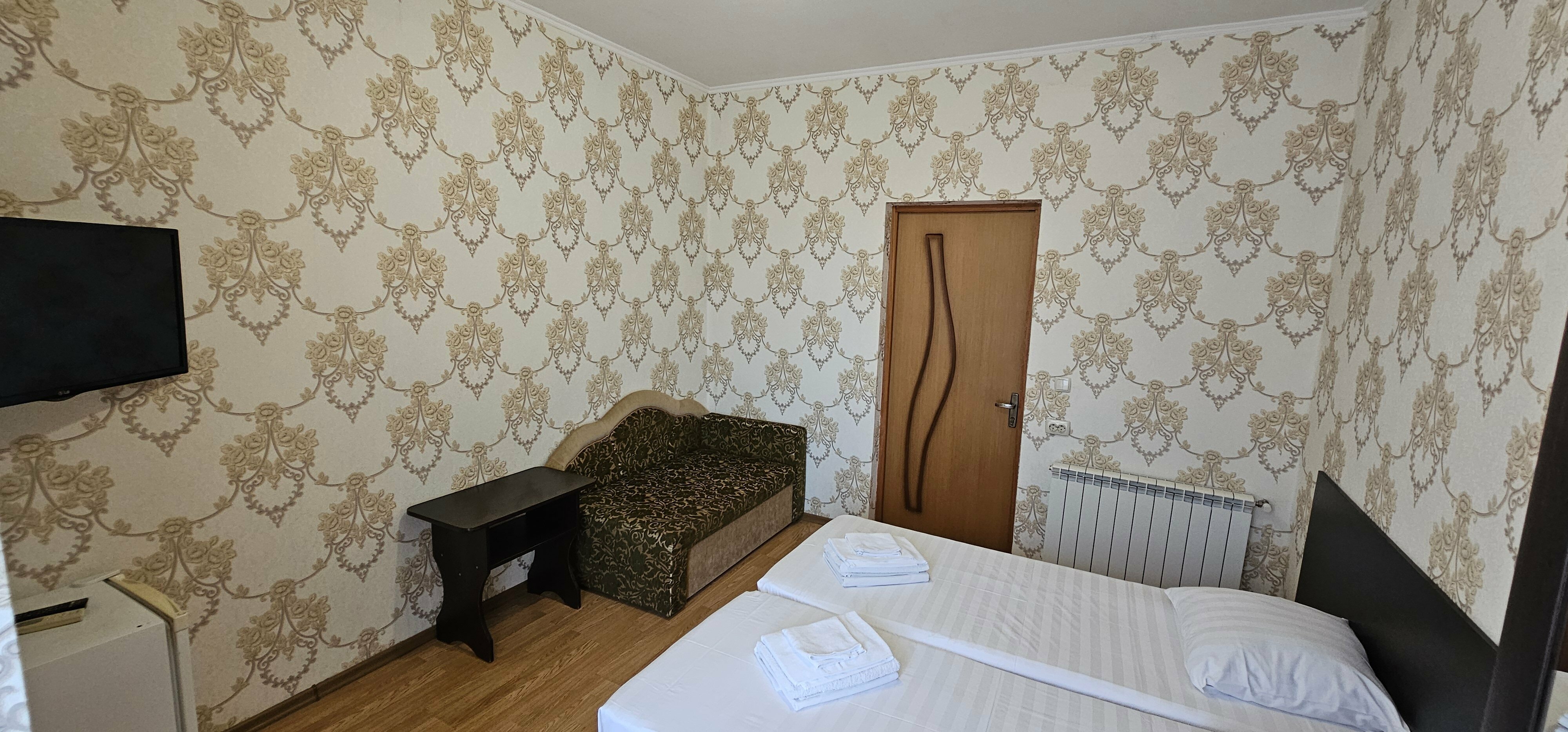 Трехместный номер с балконом