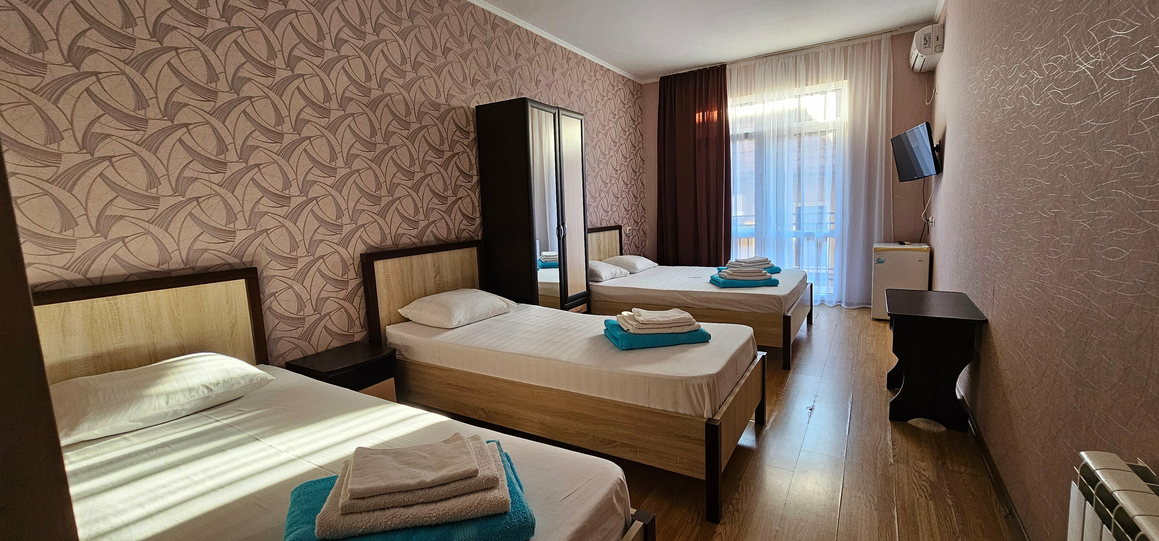 Четырехместный номер с балконом