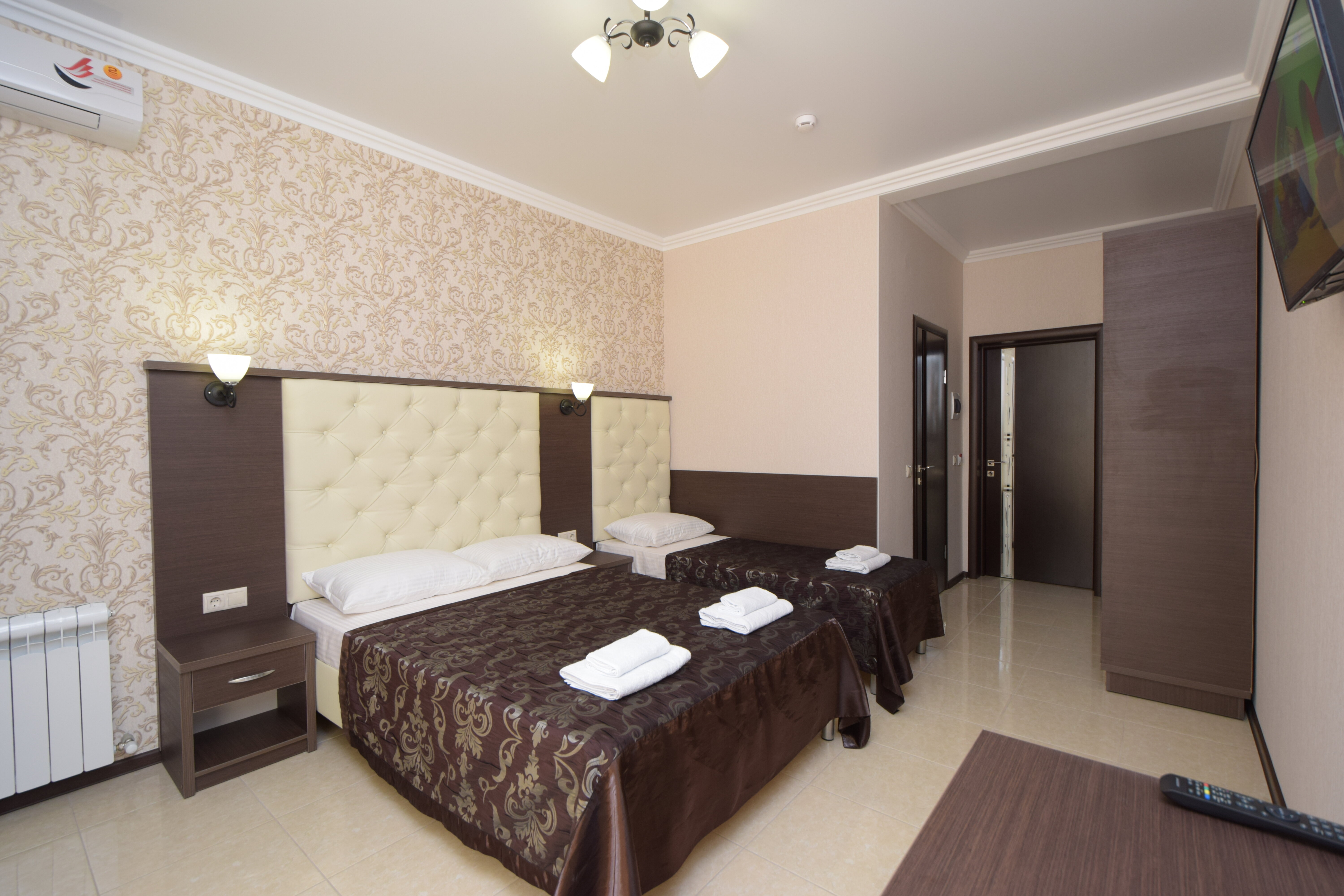 Трехместный номер с балконом