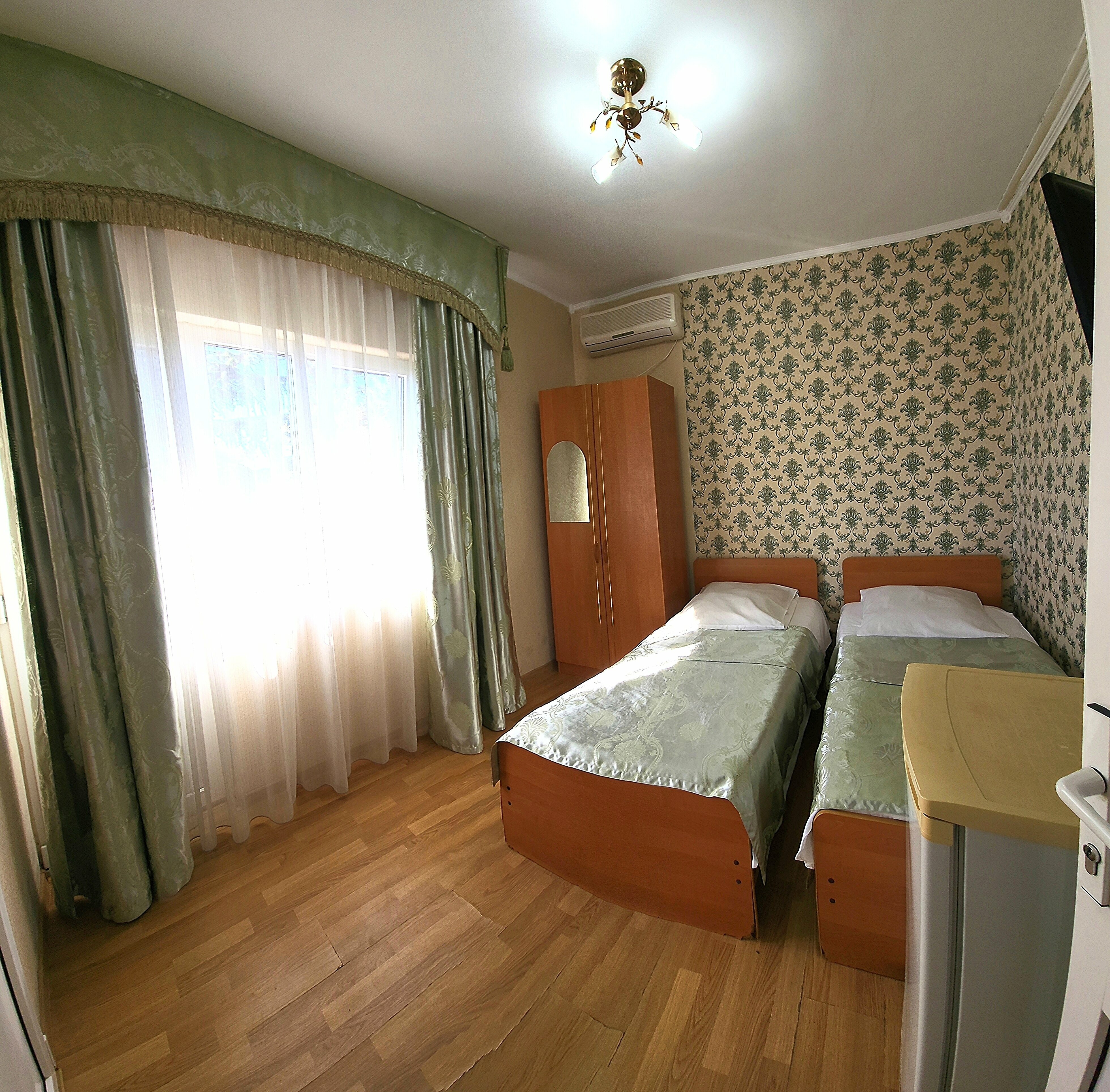 Двухместный номер с 2 отдельными кроватями и балконом