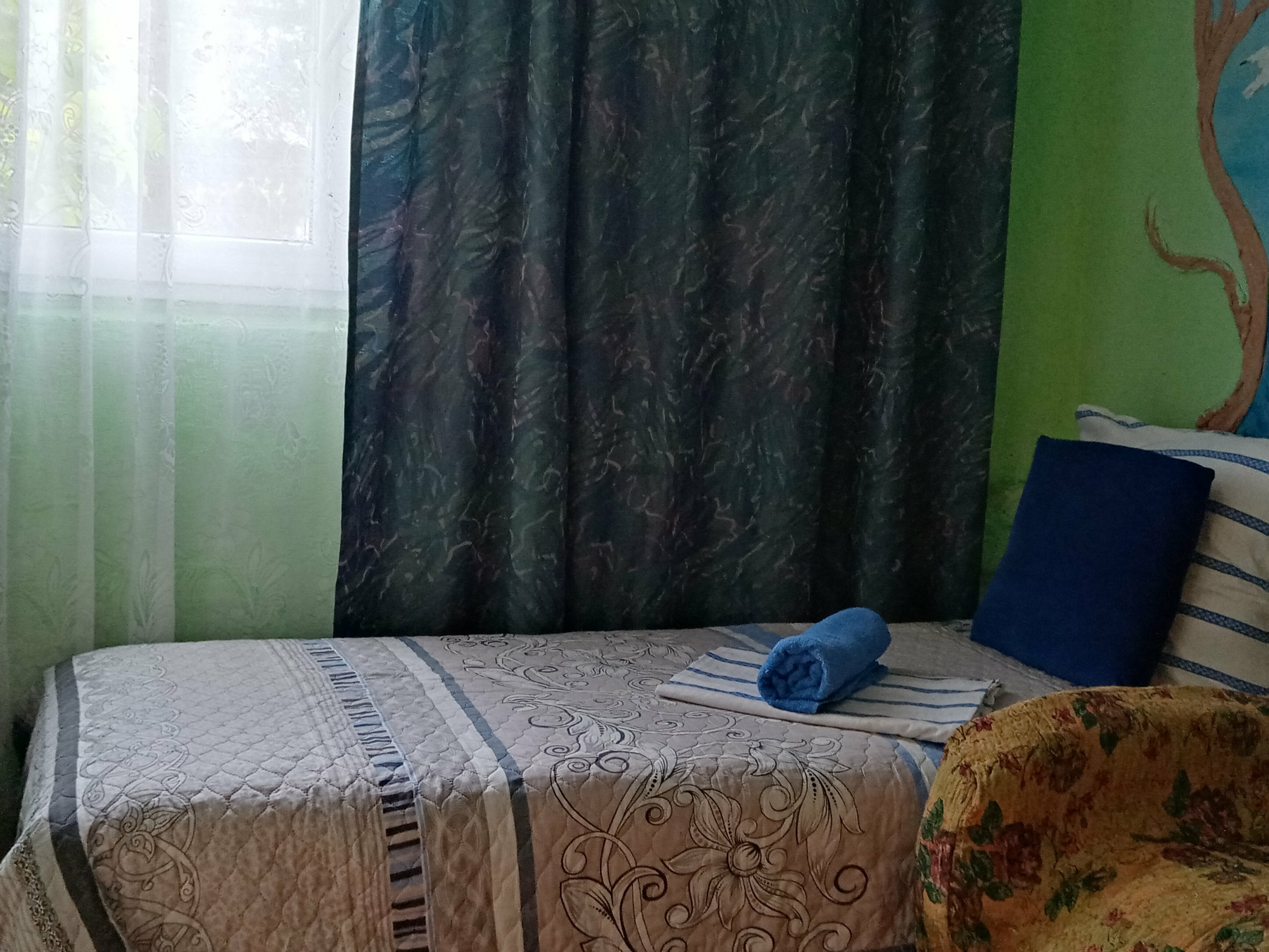 Четырехместный номер с видом на сад