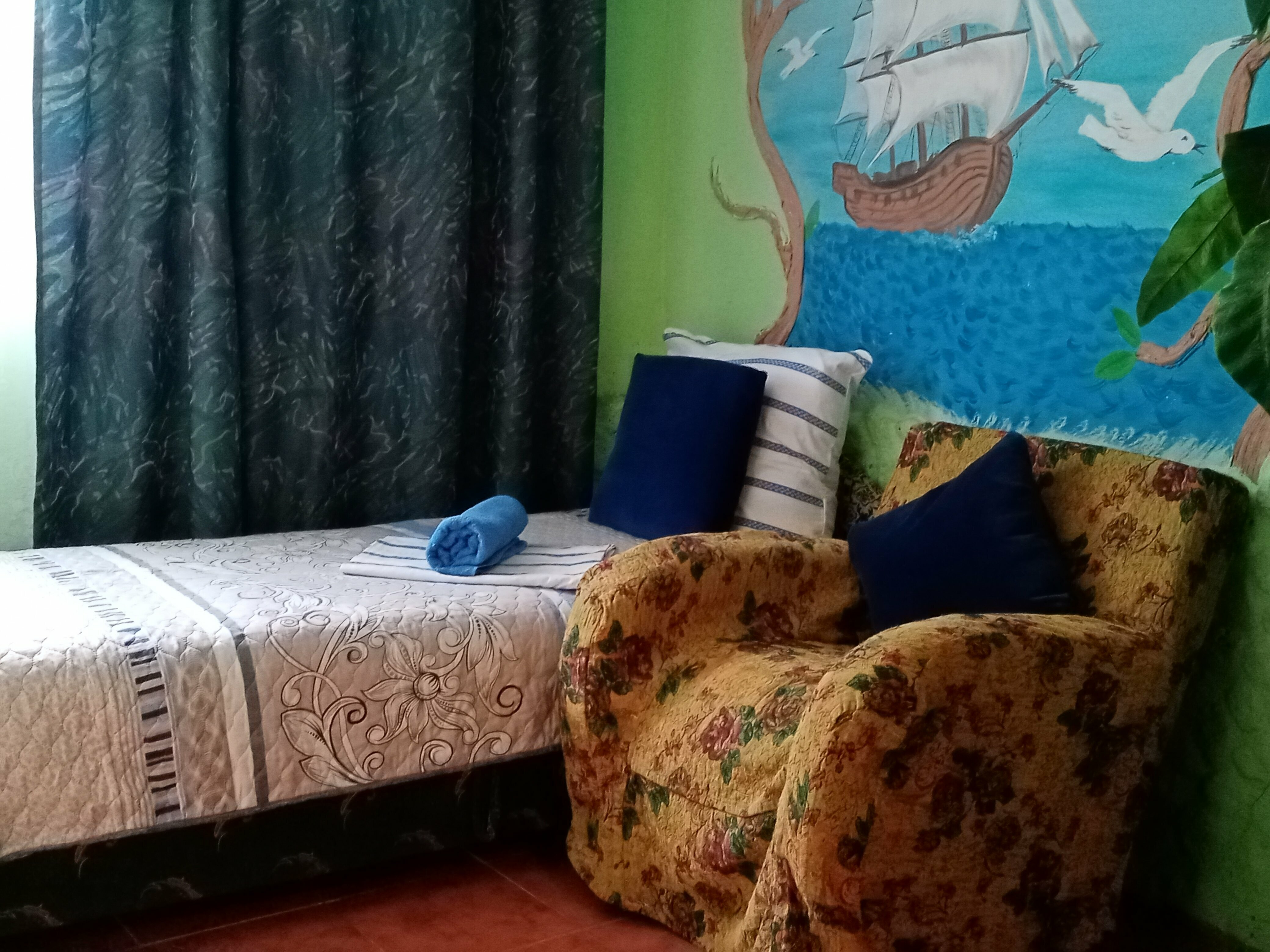 Четырехместный номер с видом на сад