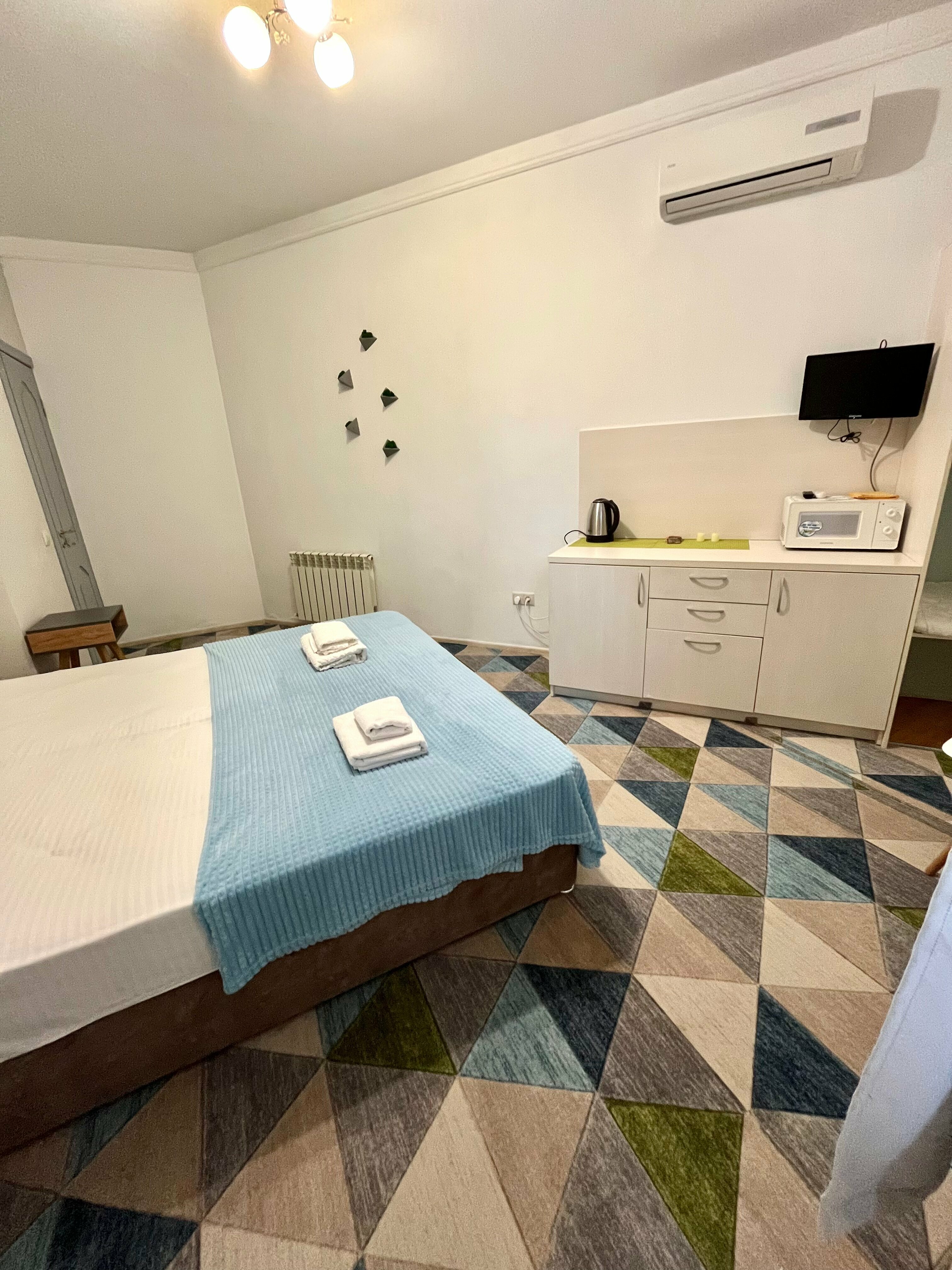 Улучшенный номер с кроватью "King-size" или двумя отдельными кроватями и доп. местом